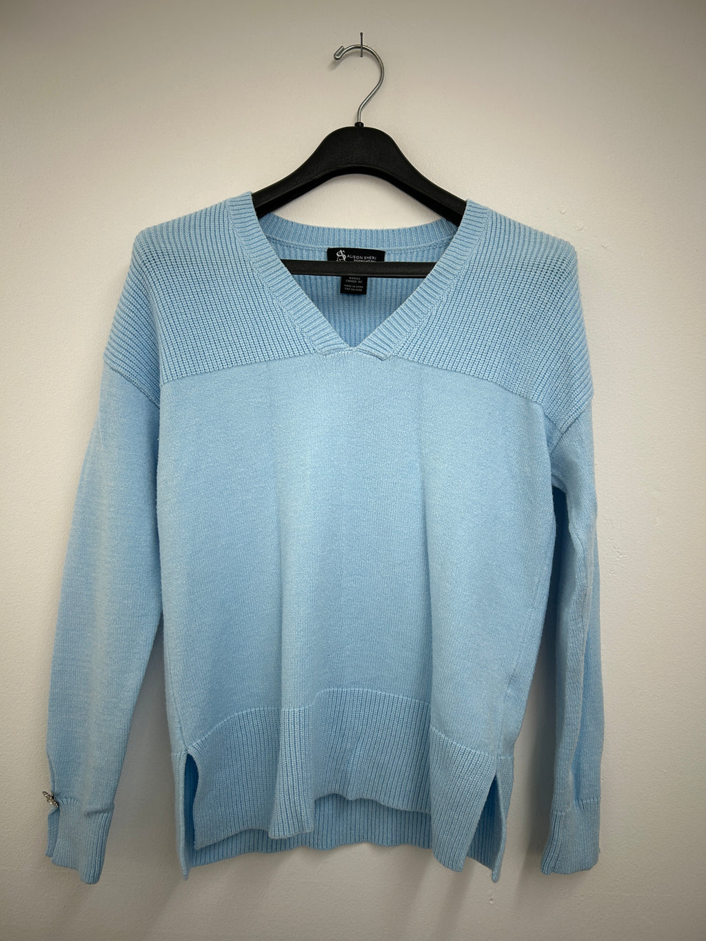 Chandail bleu pâle en tricot