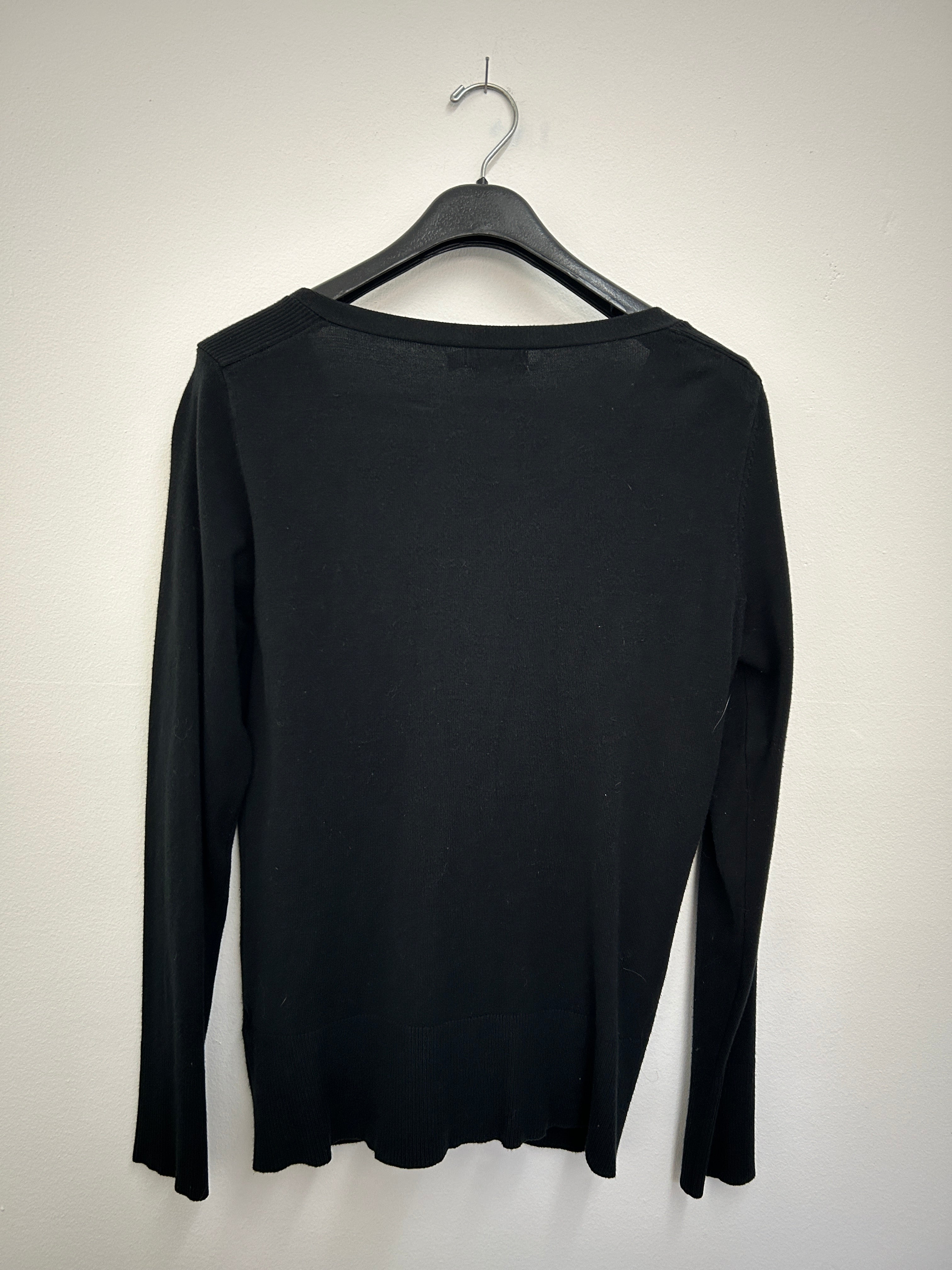 Cardigan noir à fermeture éclair et poches zippées