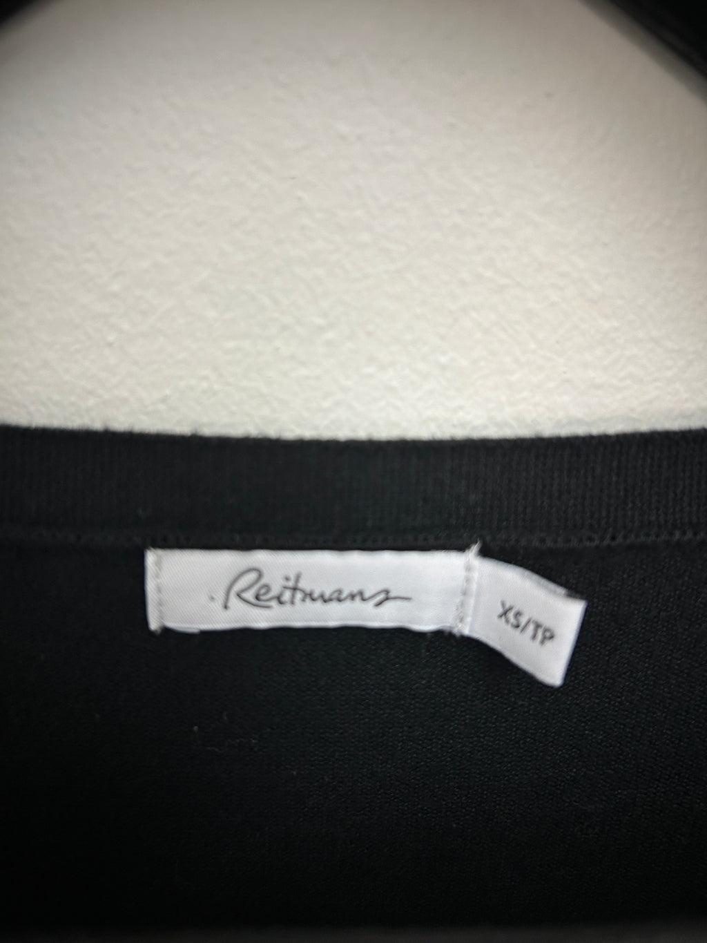 Cardigan noir à fermeture éclair et poches zippées