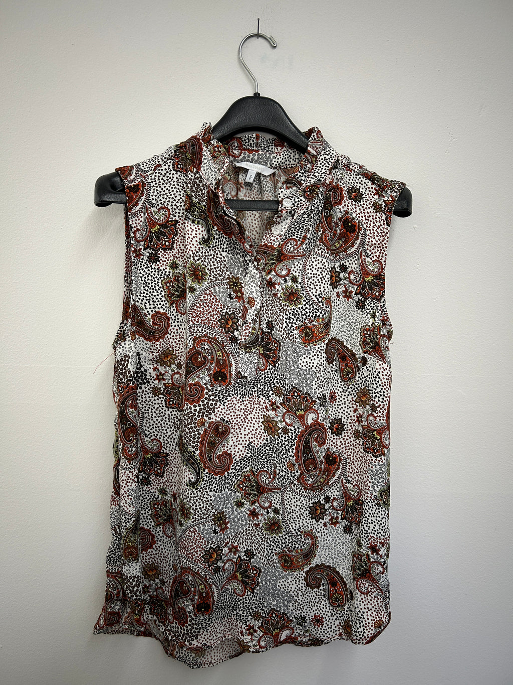 Blouse sans manches fleurie à pois