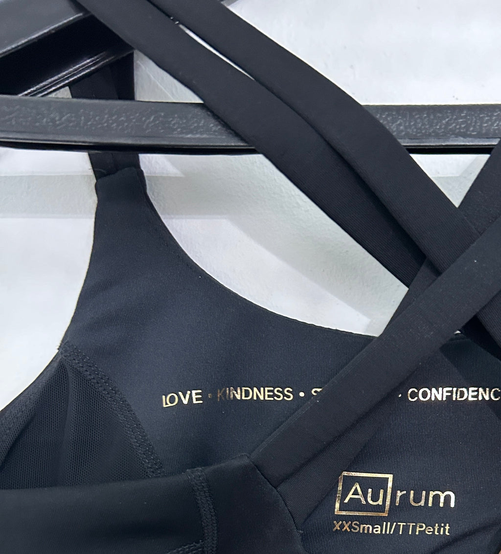 Top noir croisé à bretelles