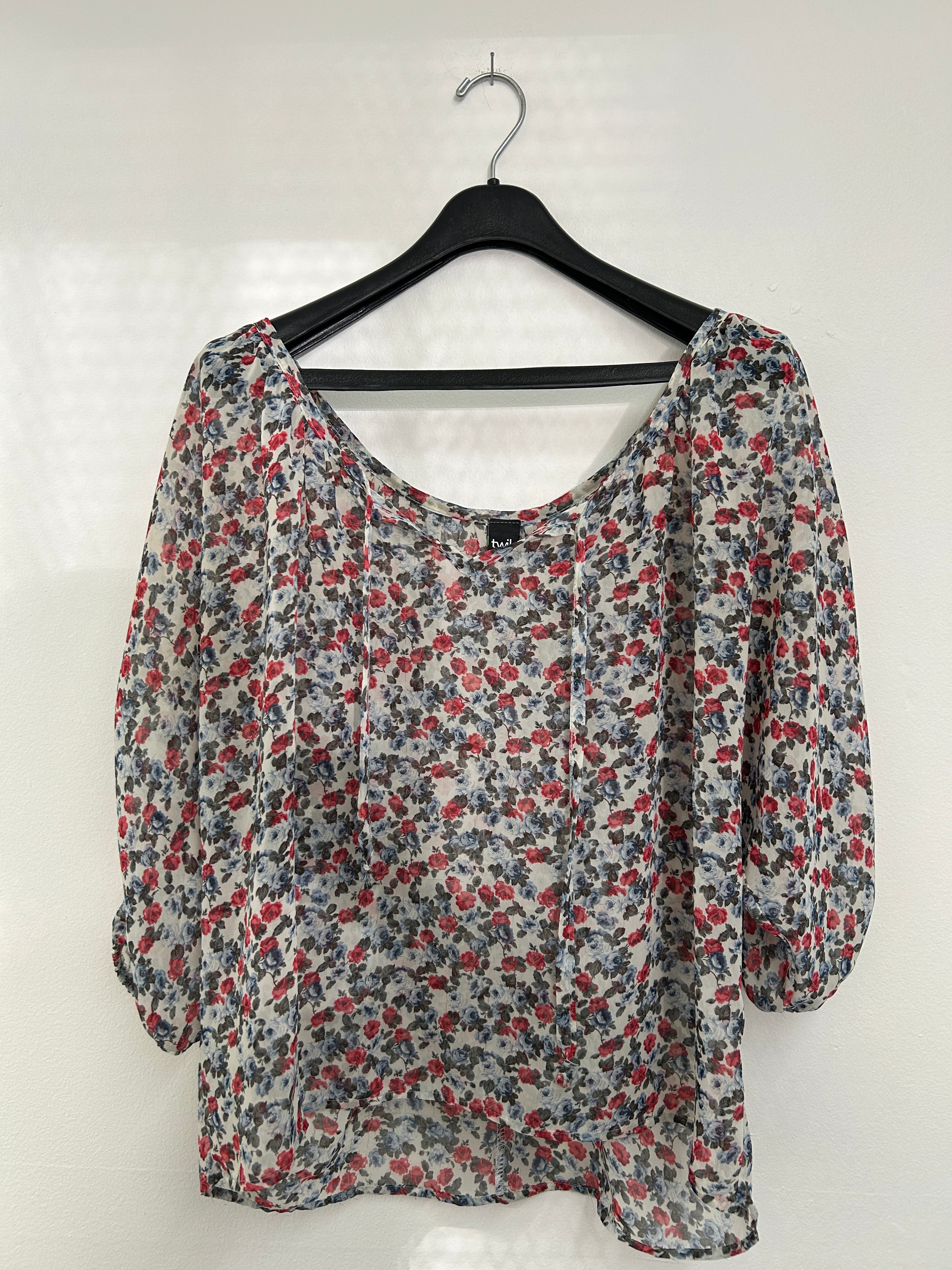 Blouse fleurie transparente