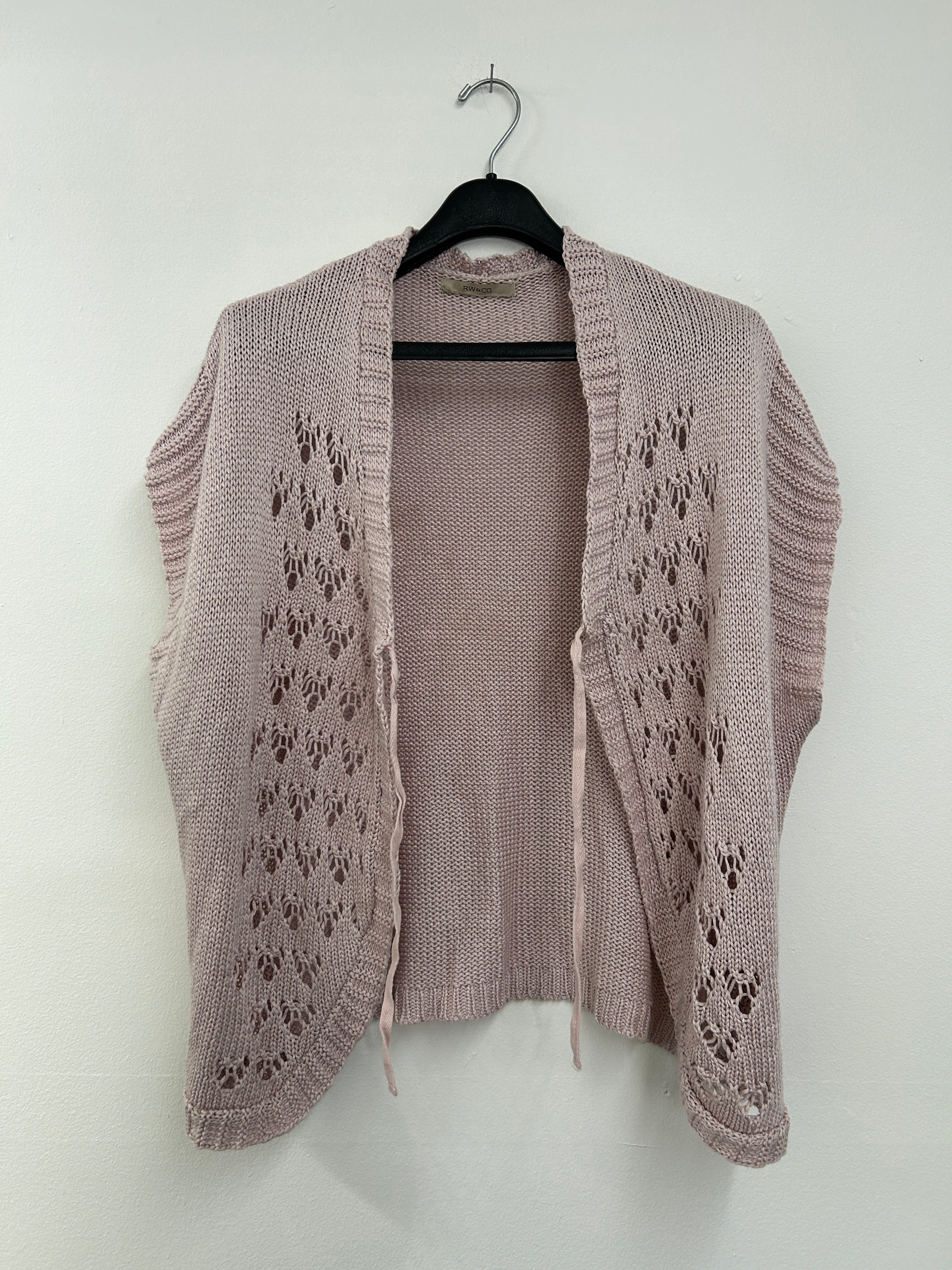 Cardigan ajouré sans manches rose poudré