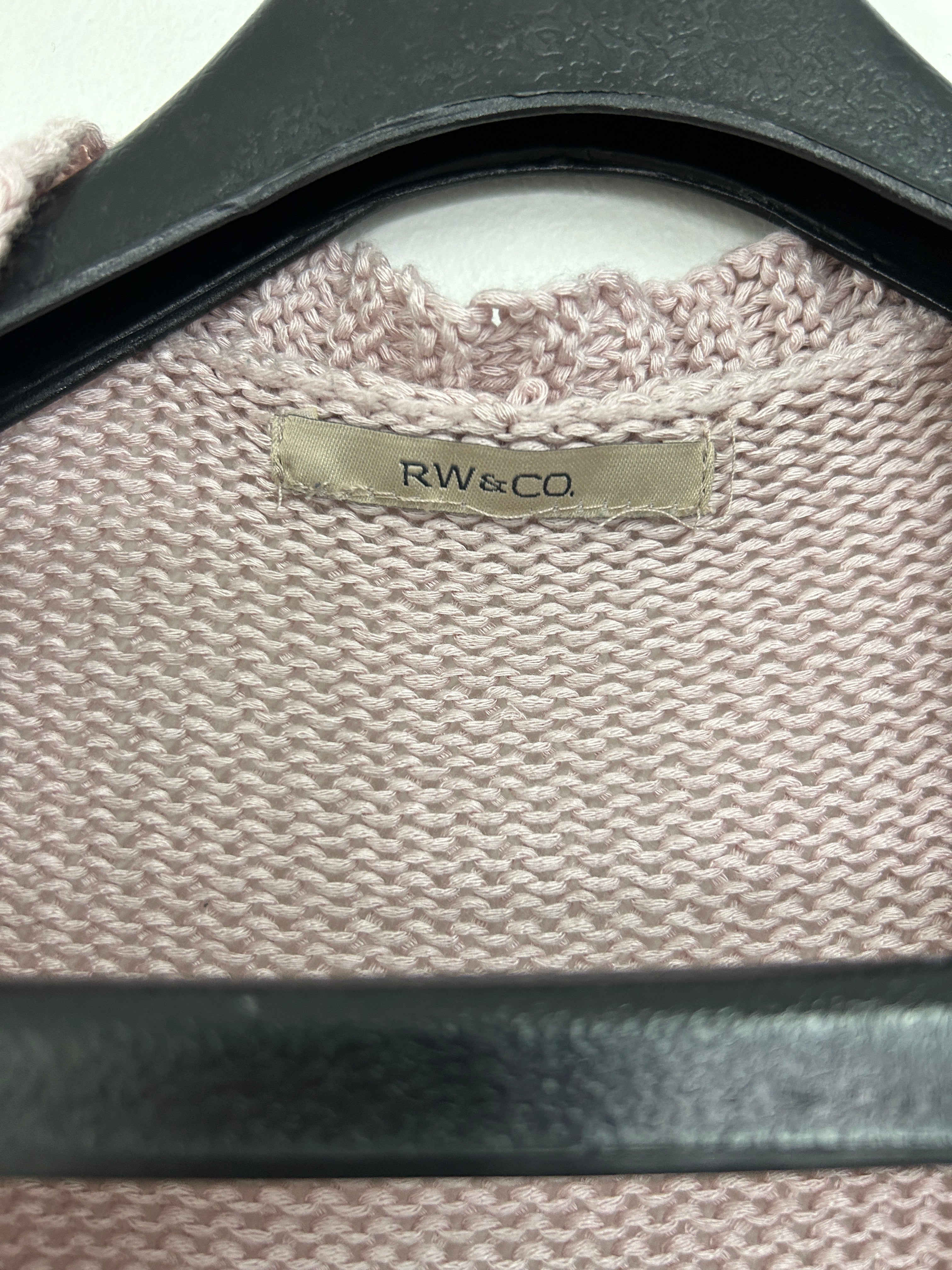 Cardigan ajouré sans manches rose poudré