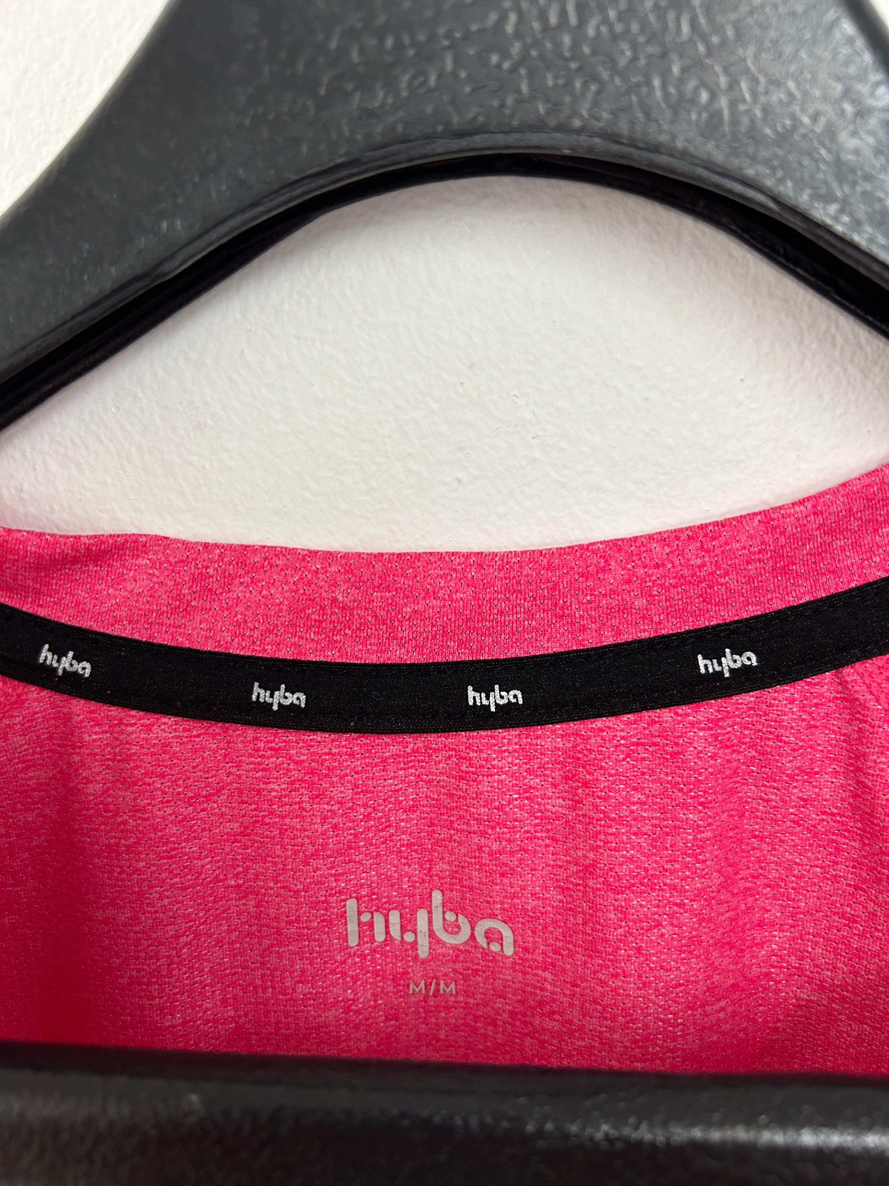 T-shirt sport rose avec poche zippée