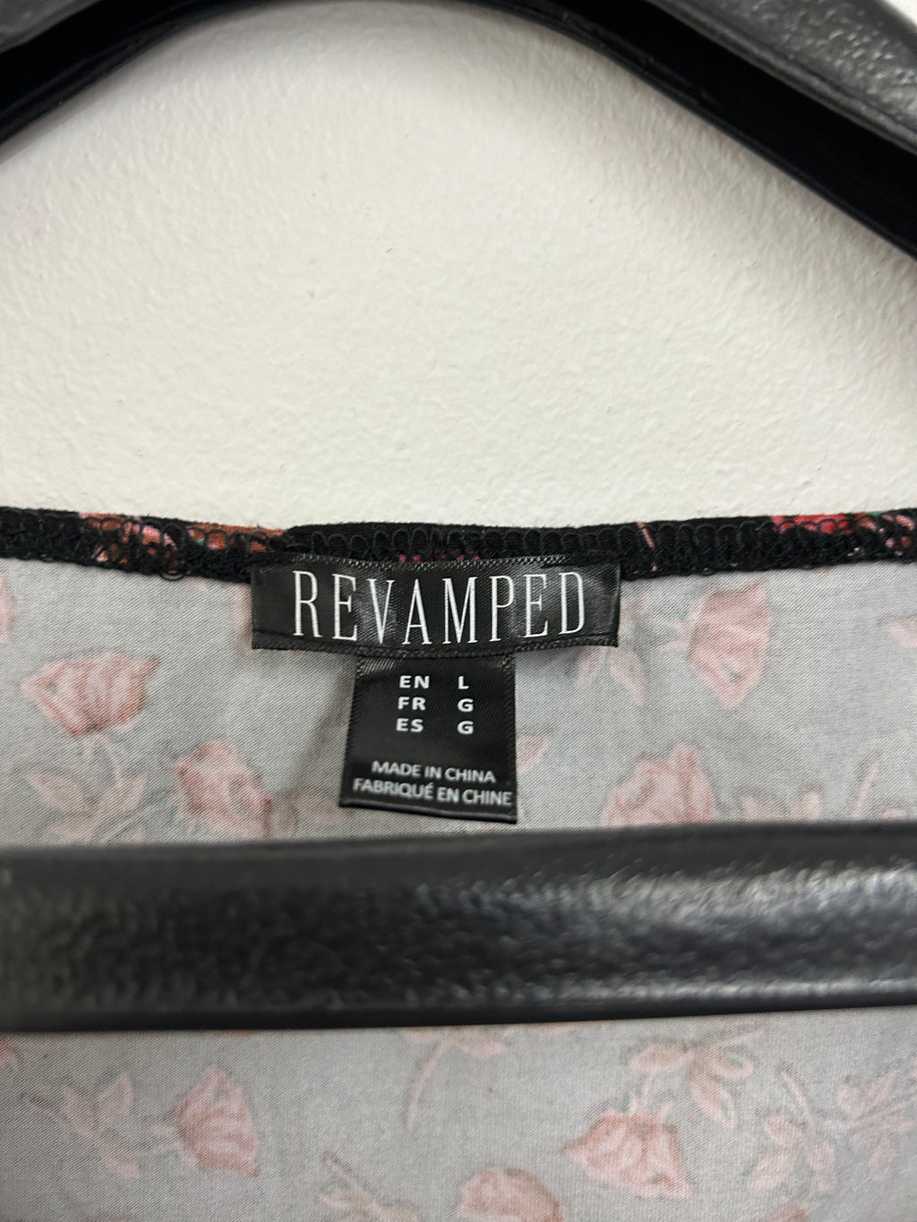 Haut noir à fleurs rouges manches longues