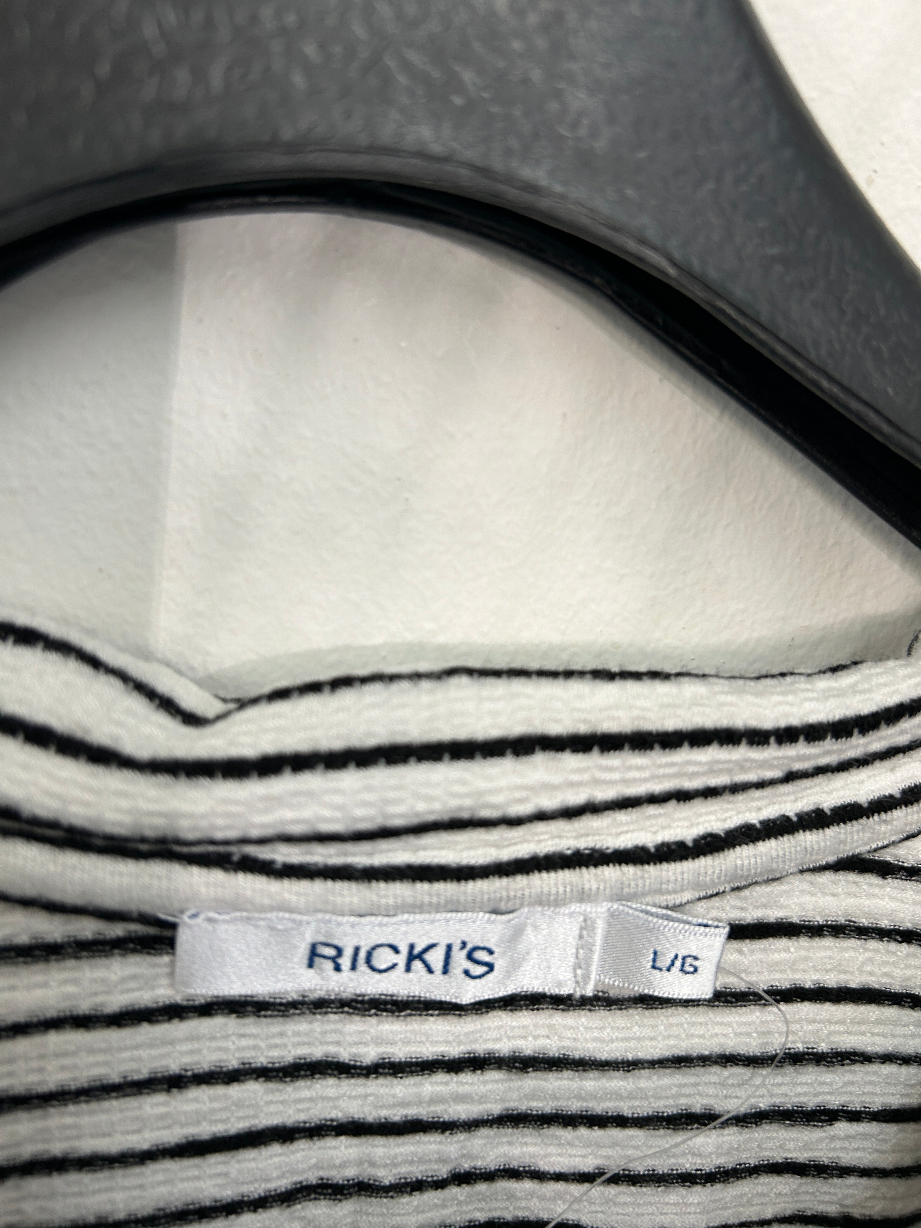 T-shirt col polo rayé blanc et noir