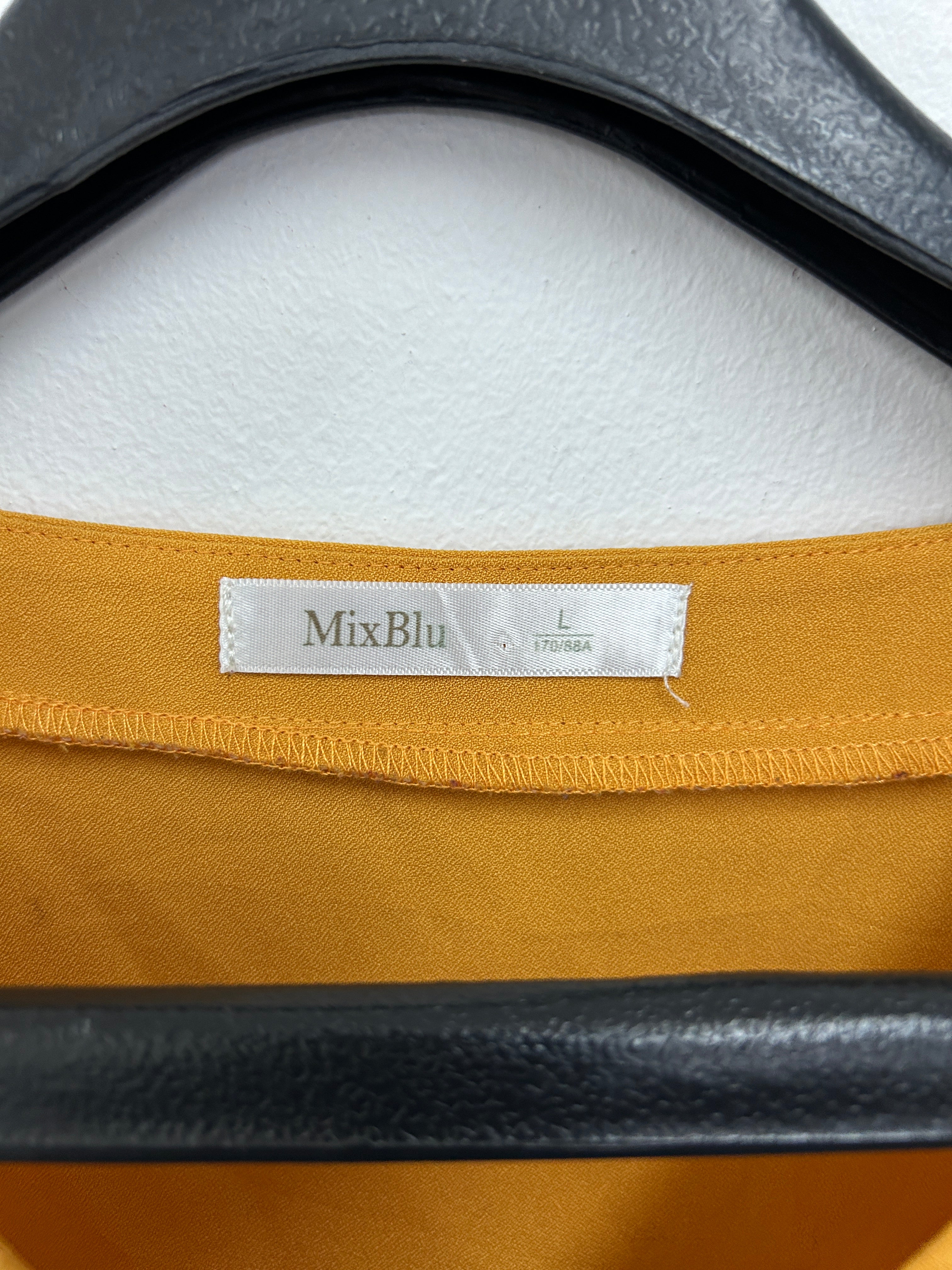 Blouse moutarde à manches brodées