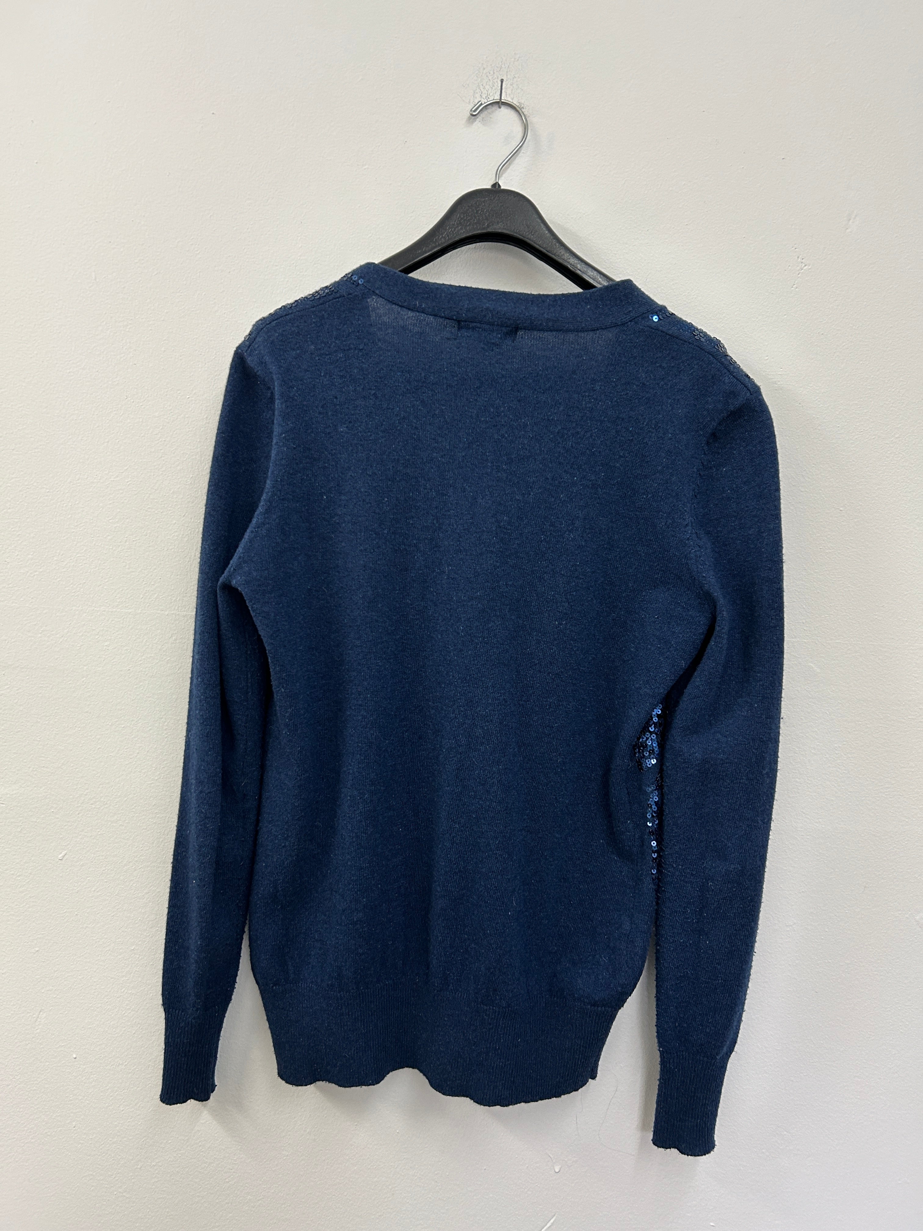 Blouse à 4 boutons avec paillets bleu au devant