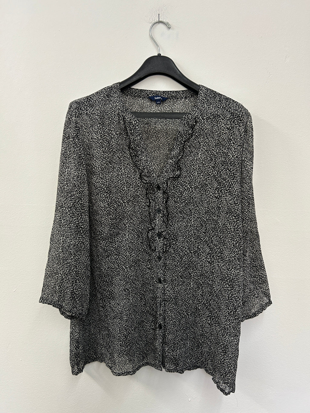 Chemise blouse léopard avec une texture mince transparent