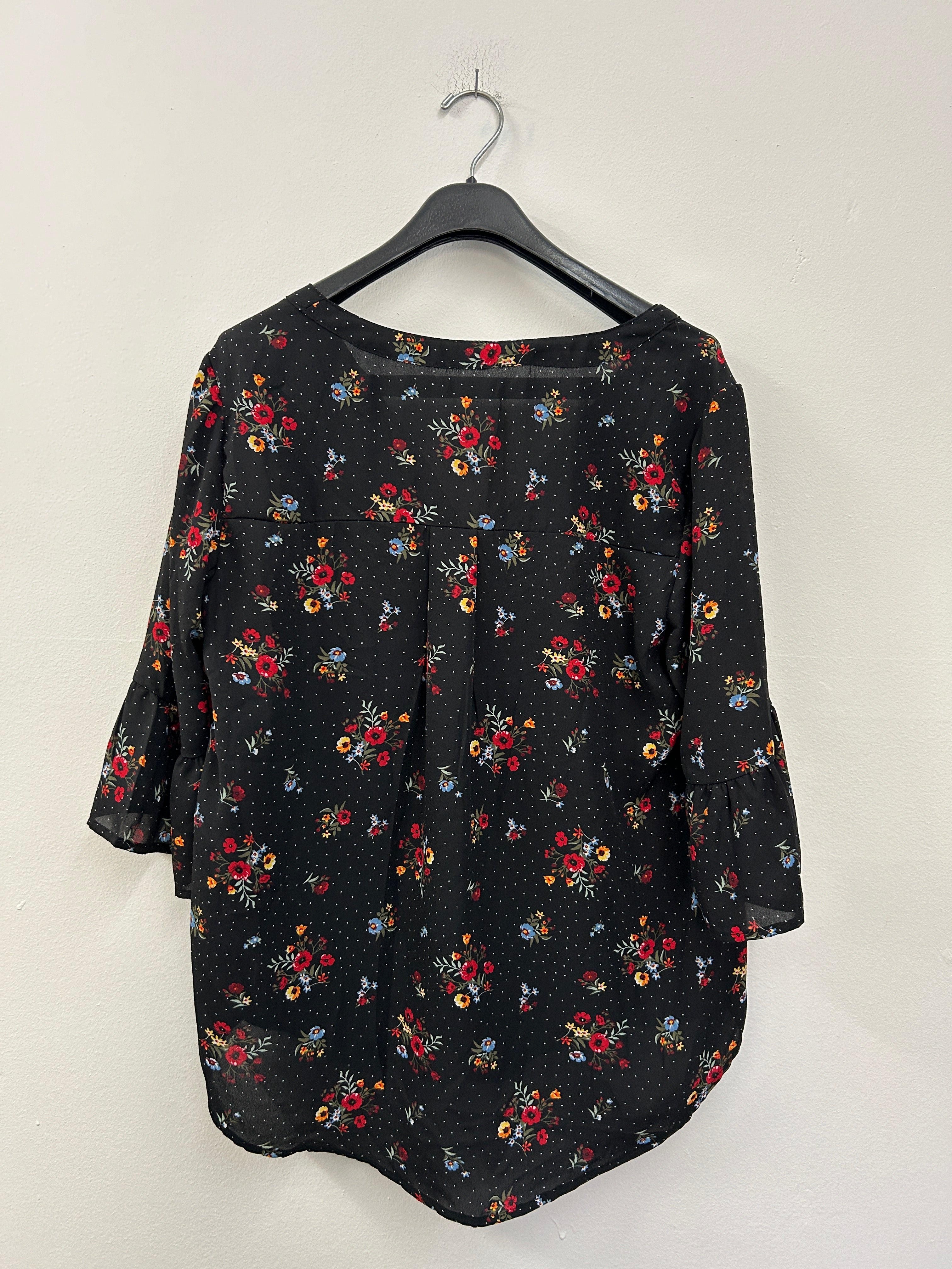 Blouse fleury à poids blanc avec zipper au coup