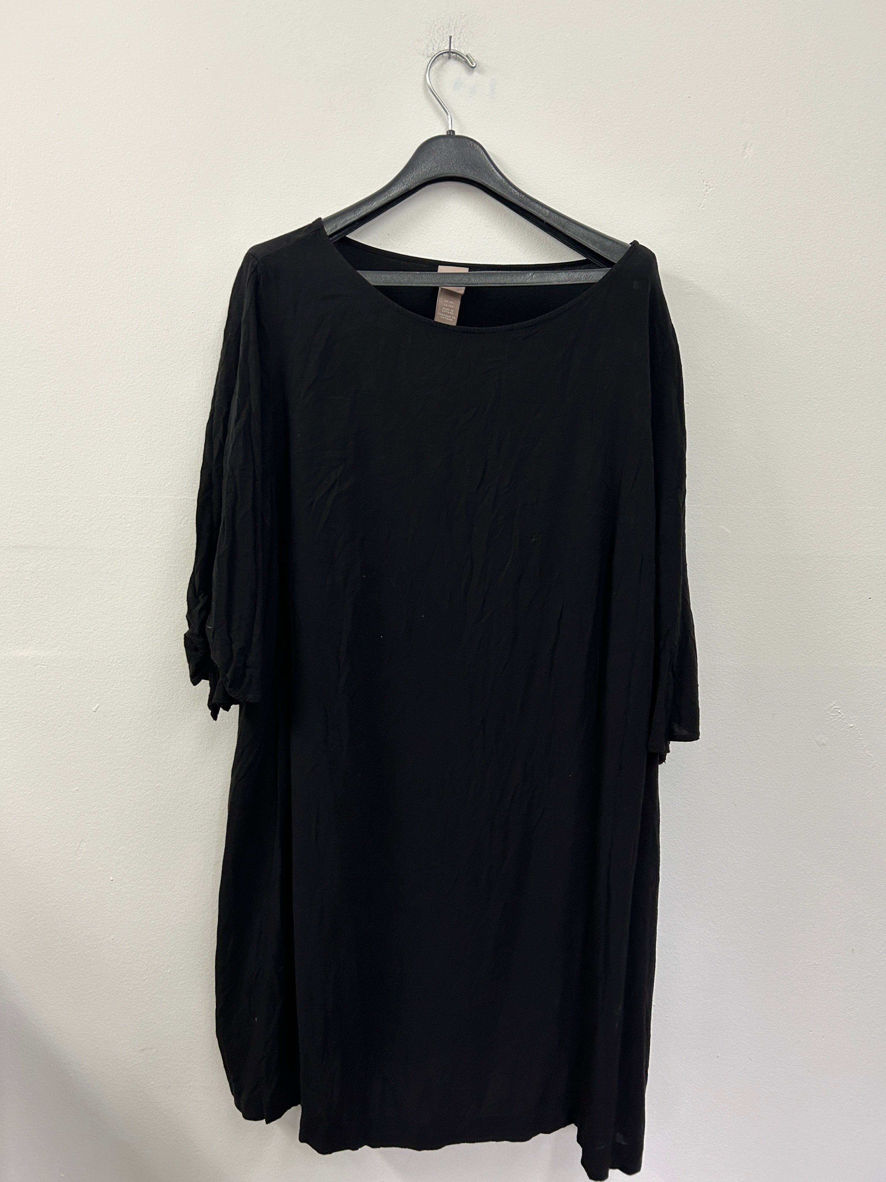 Robe tunique noire à manches nouées – H&M
