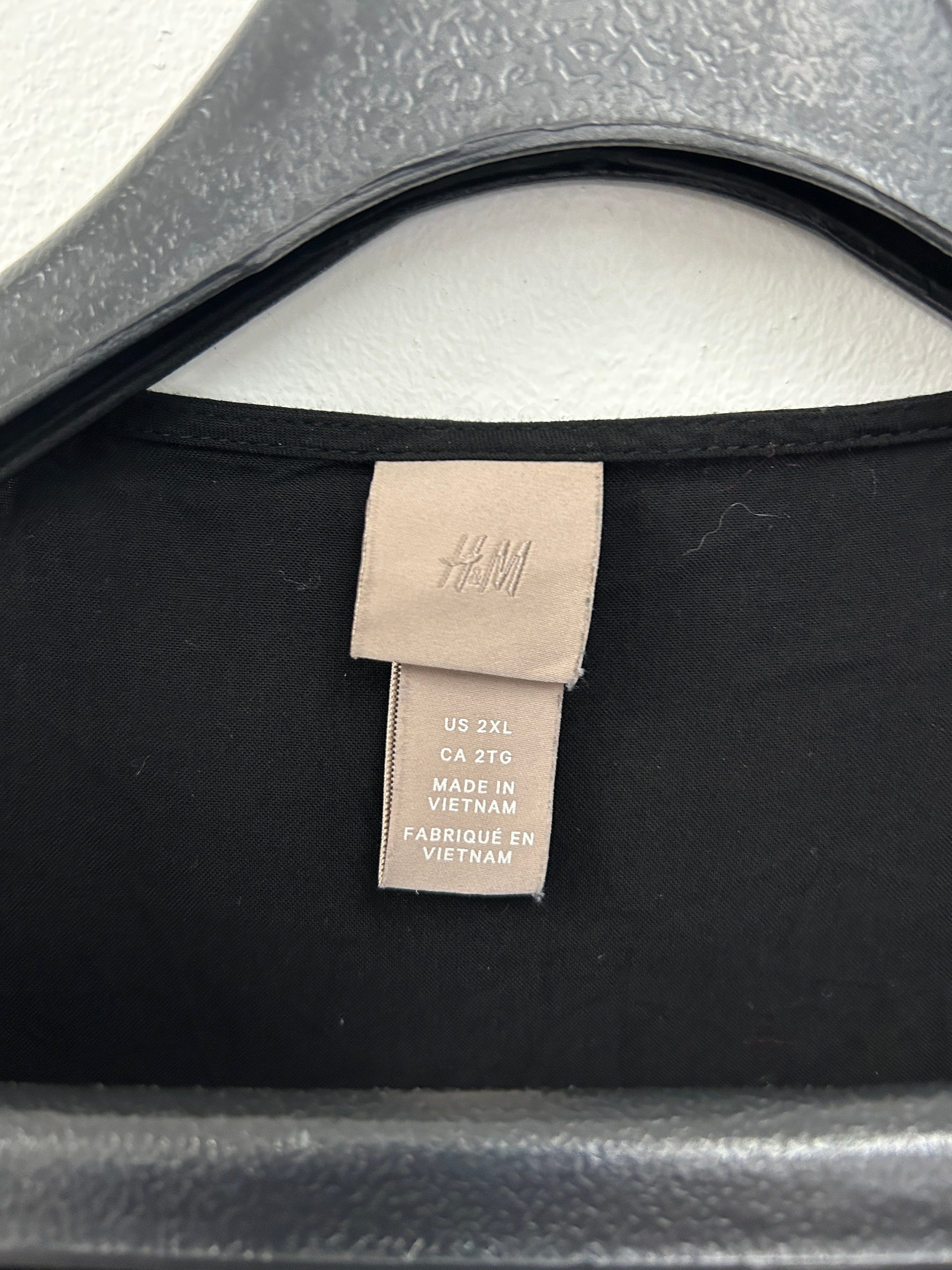 Robe tunique noire à manches nouées – H&M