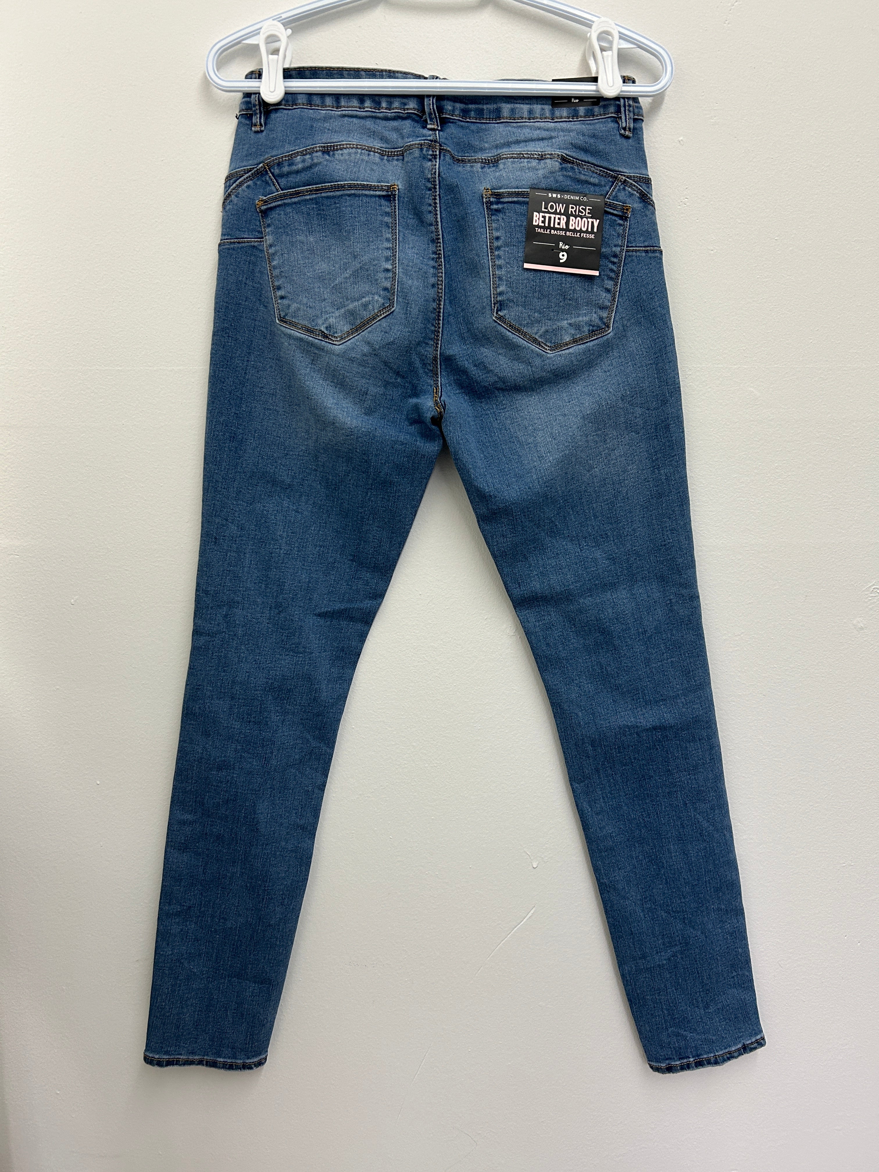 Jean bleu foncé coupe ajustée taille basse