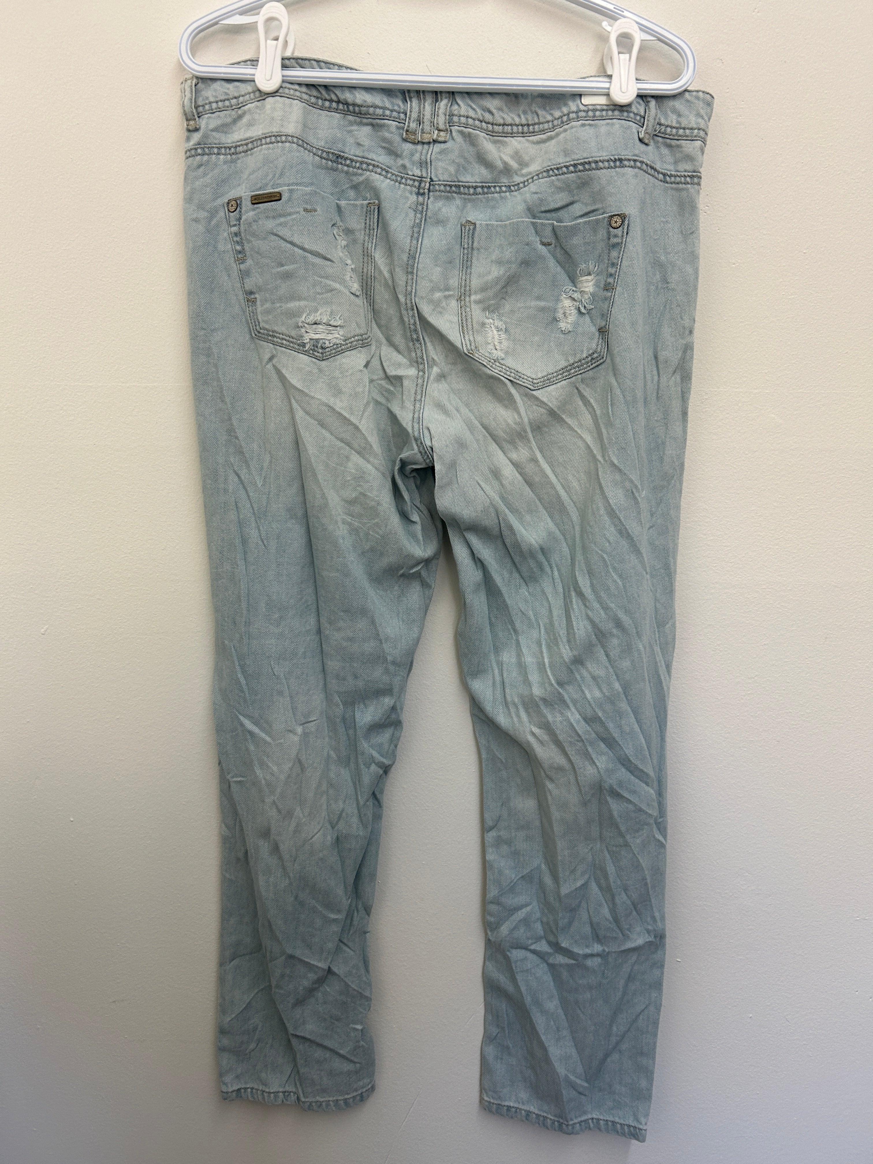 Jean bleu pâle usé à déchirures – Style décontracté tendance