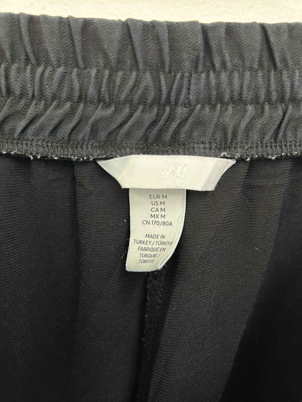 H&M | Pantalon noir fluide à taille élastique