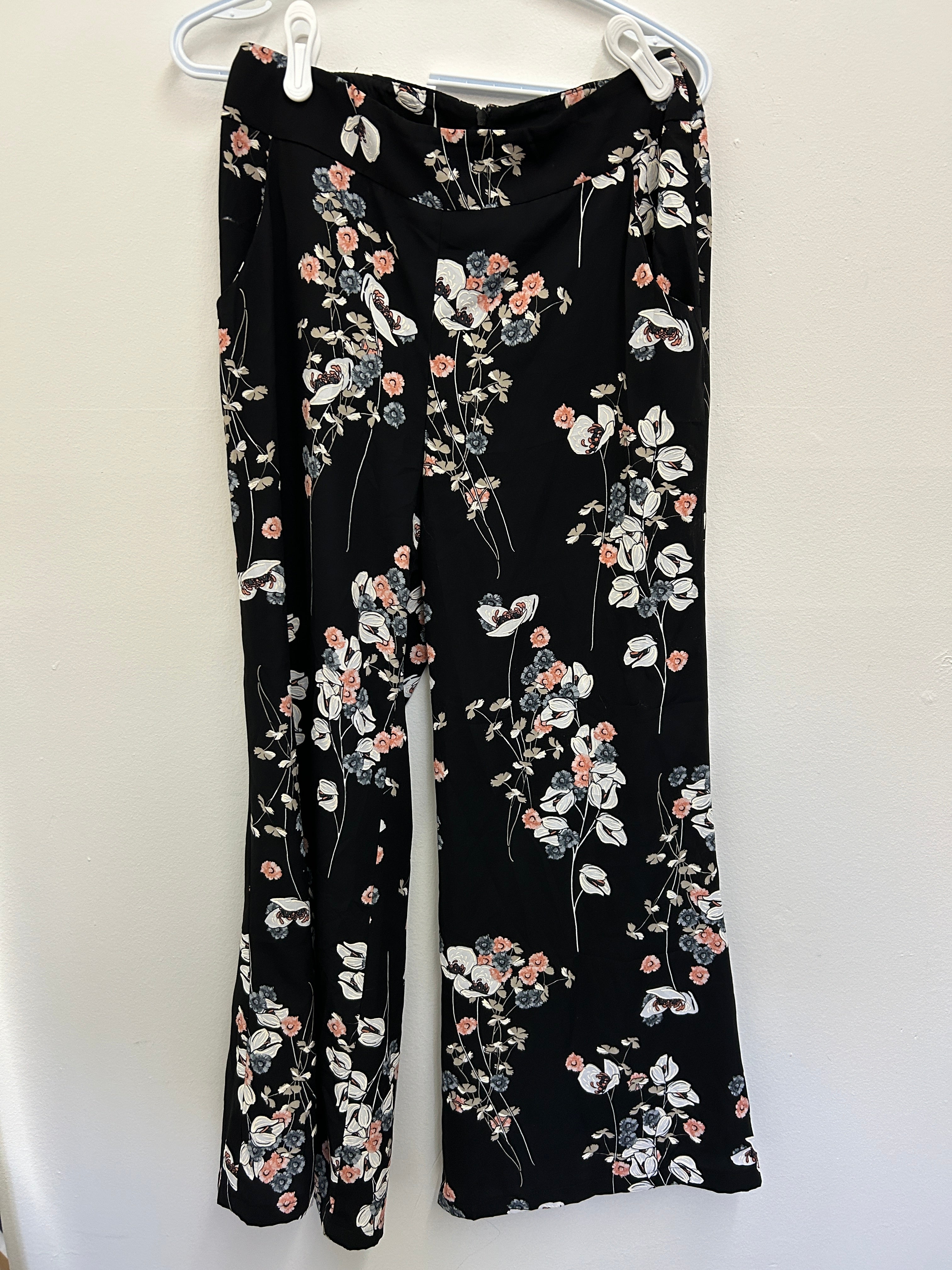 Pantalon fleuri noir avec fermeture arrière