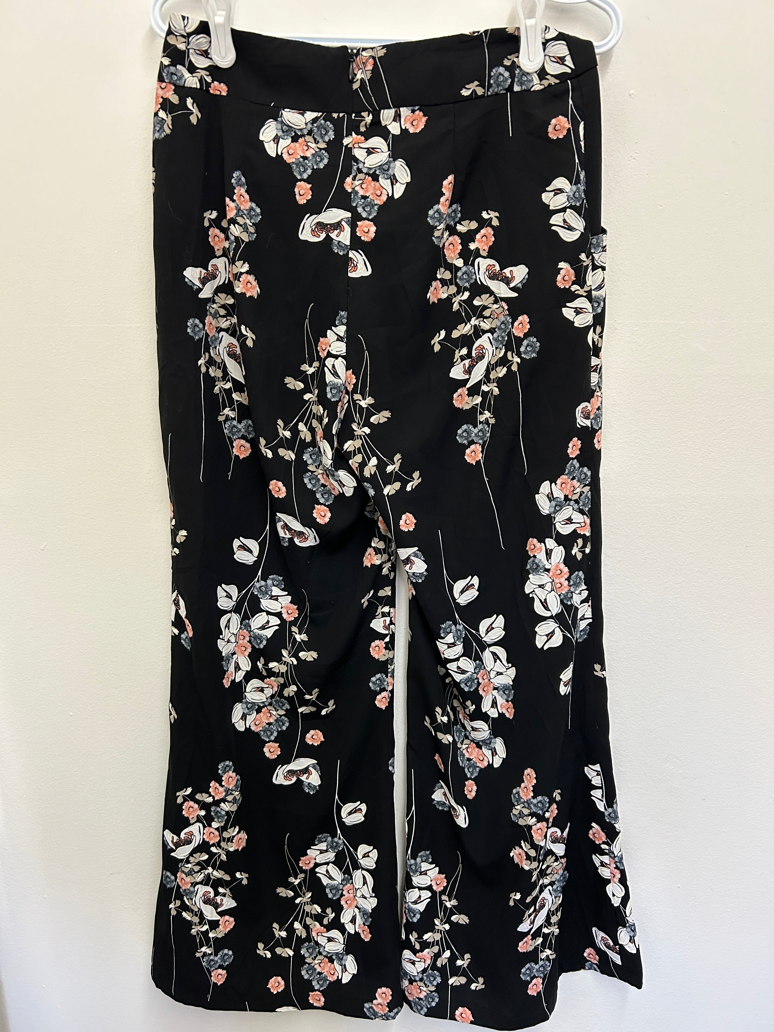 Pantalon fleuri noir avec fermeture arrière