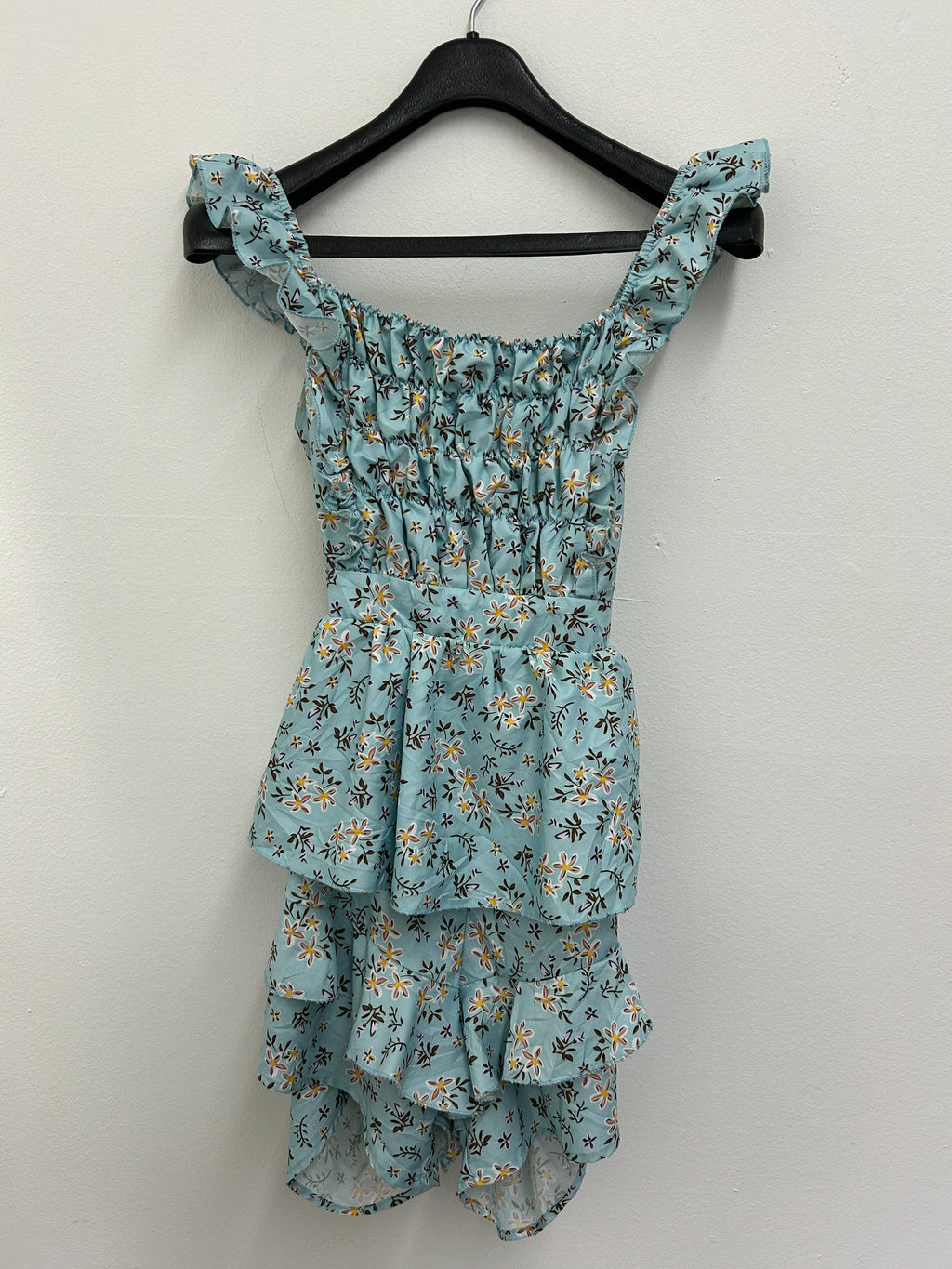 Romper à volants fleuri bleu pastel