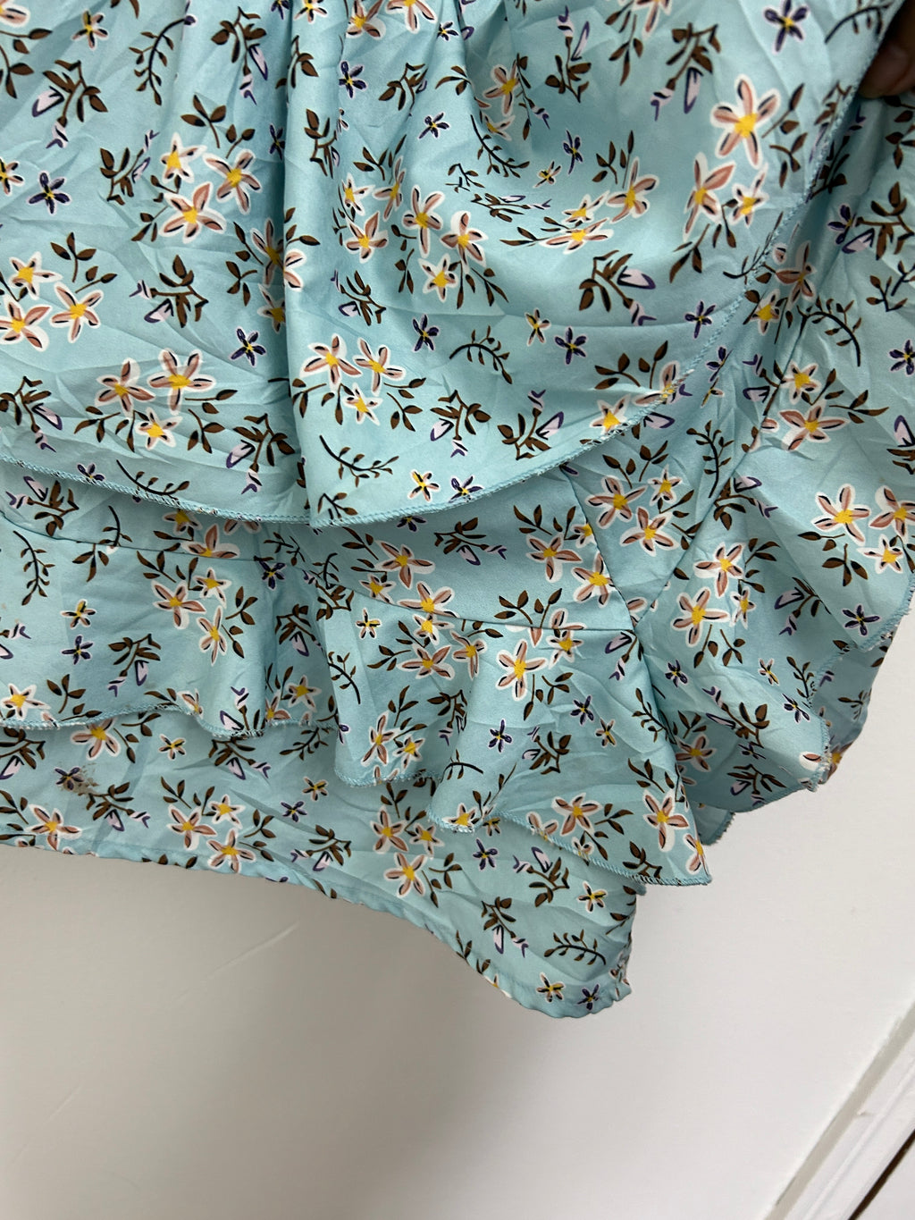 Romper à volants fleuri bleu pastel