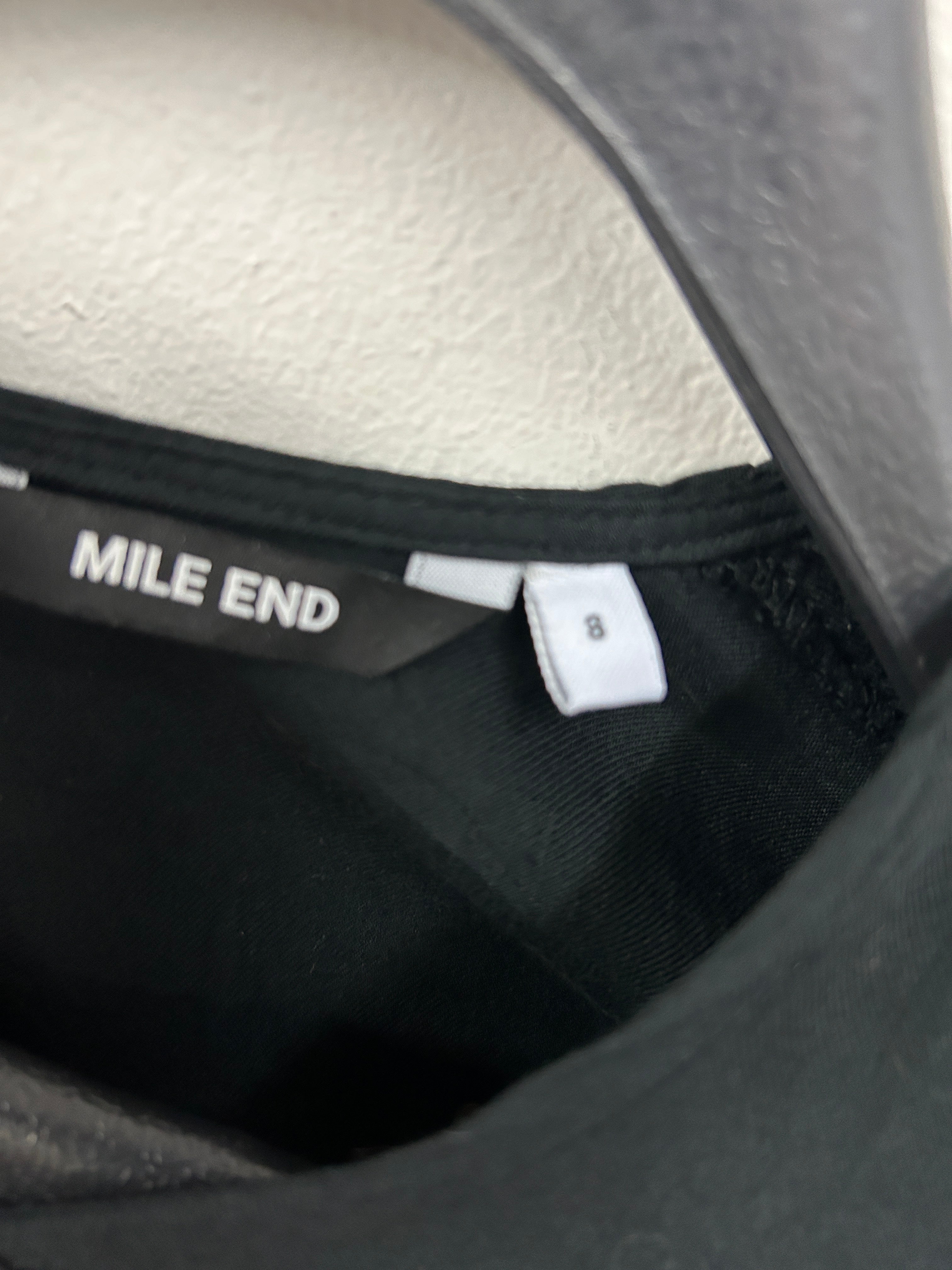 Robe noire portefeuille – Mile End