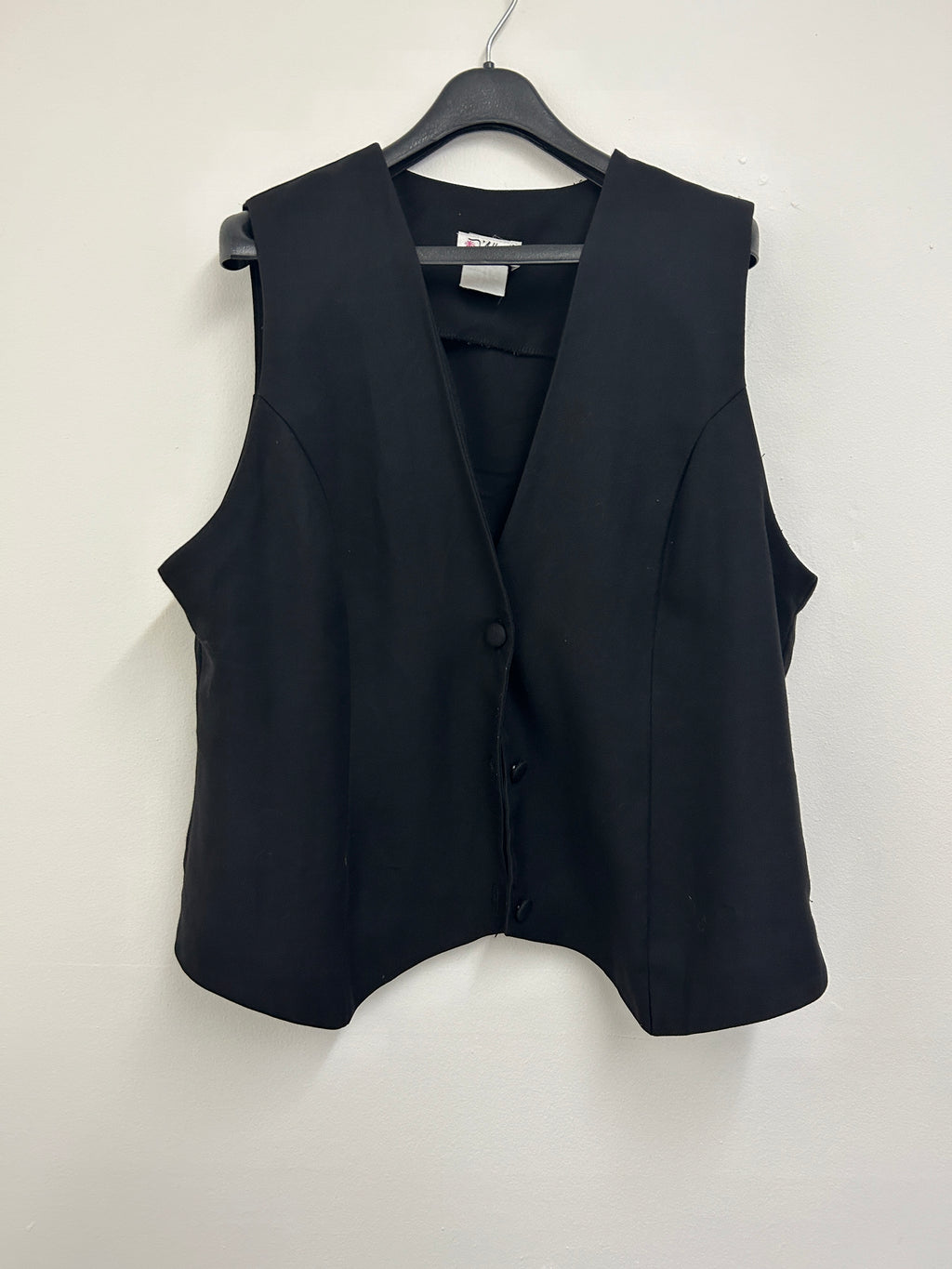 Gilet tailleur noir à col en V — D’Allaird’s