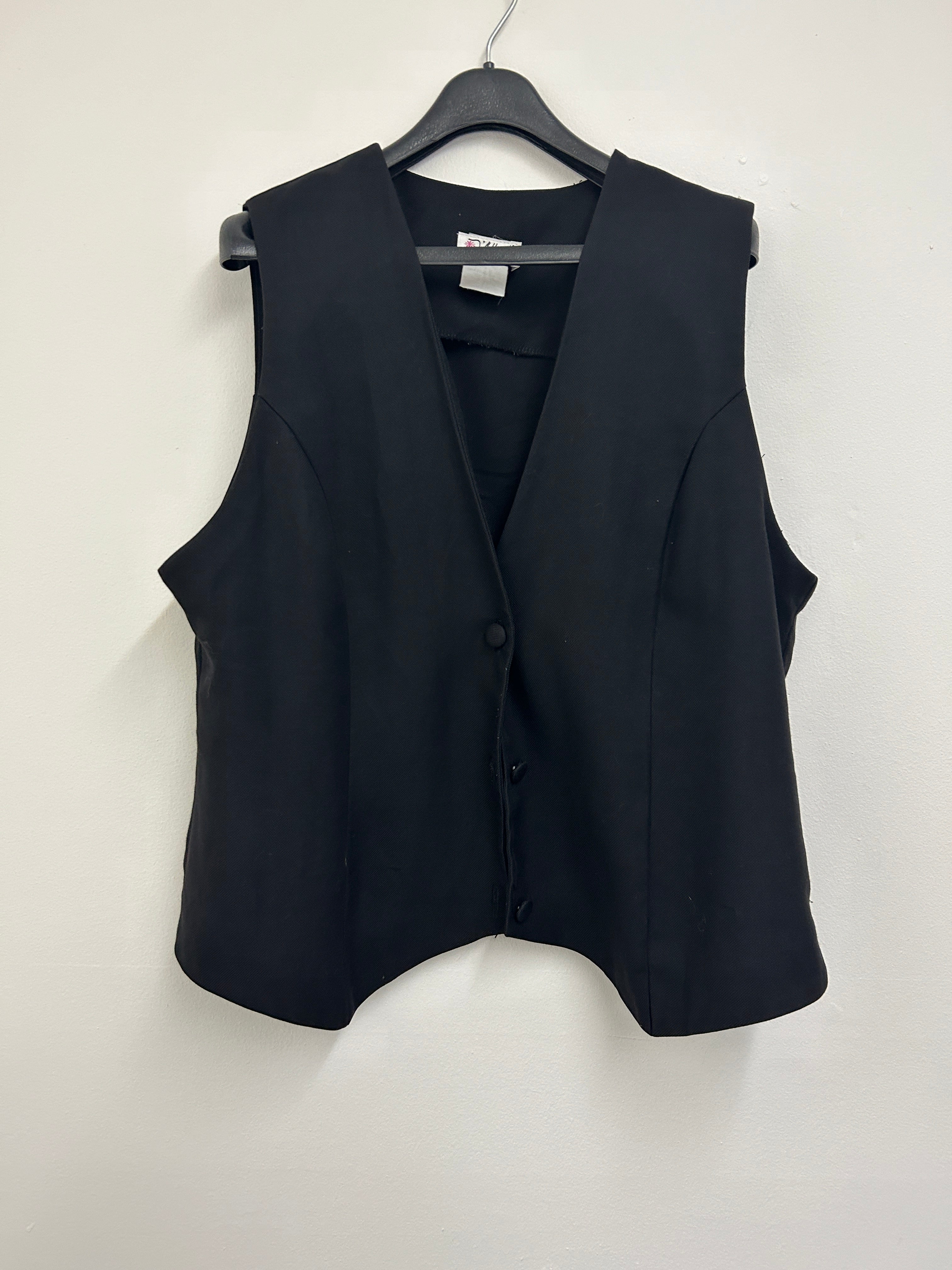 Gilet tailleur noir à col en V — D’Allaird’s