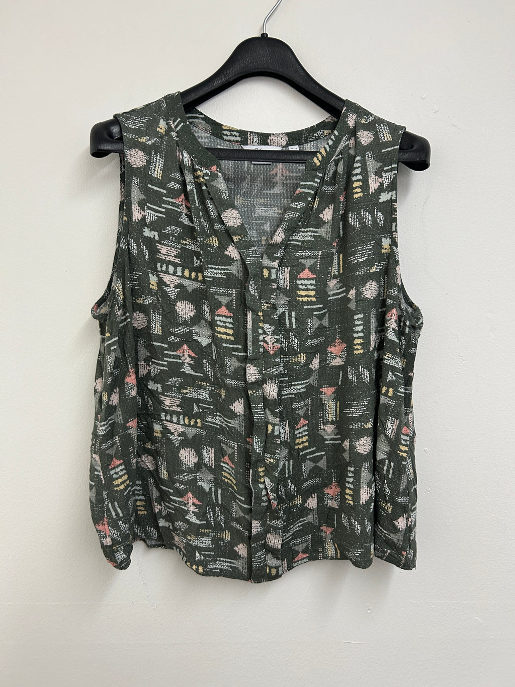 Haut sans manches vert à motifs géométriques