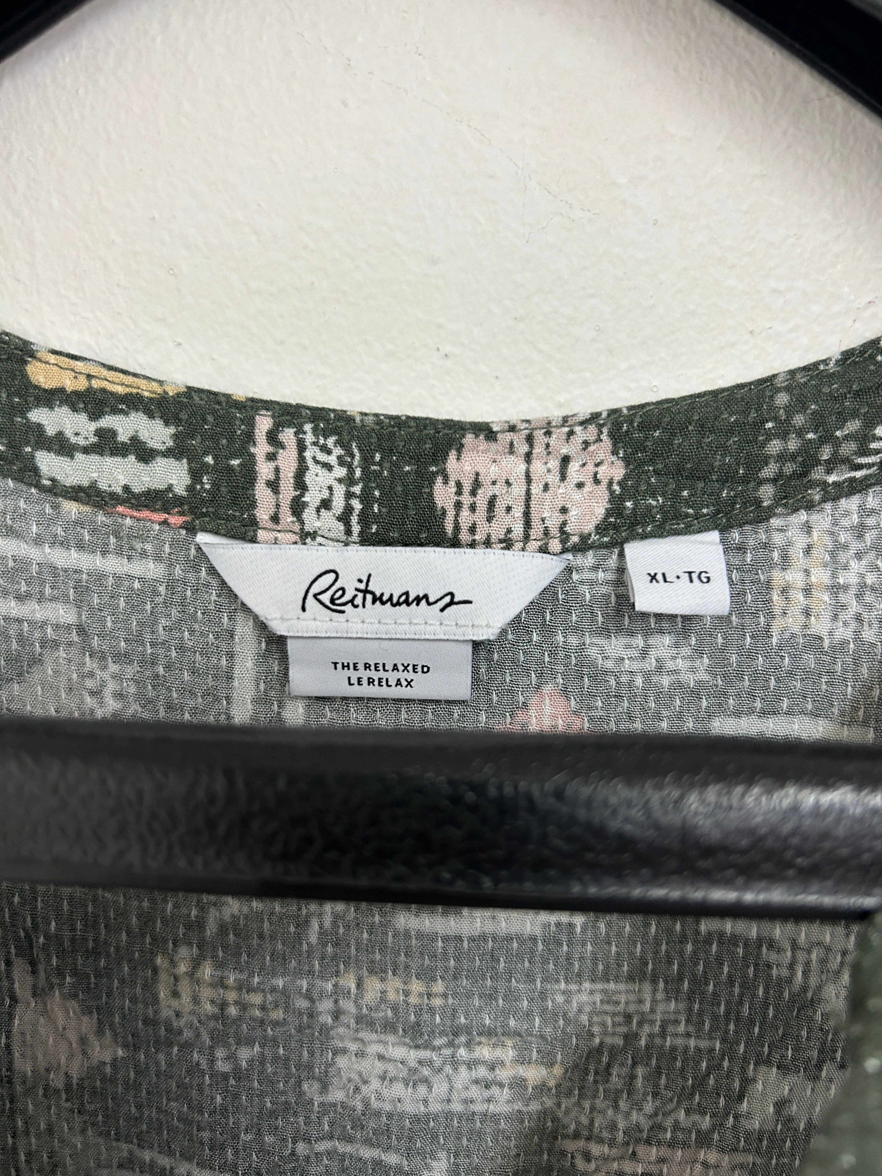 Haut sans manches vert à motifs géométriques