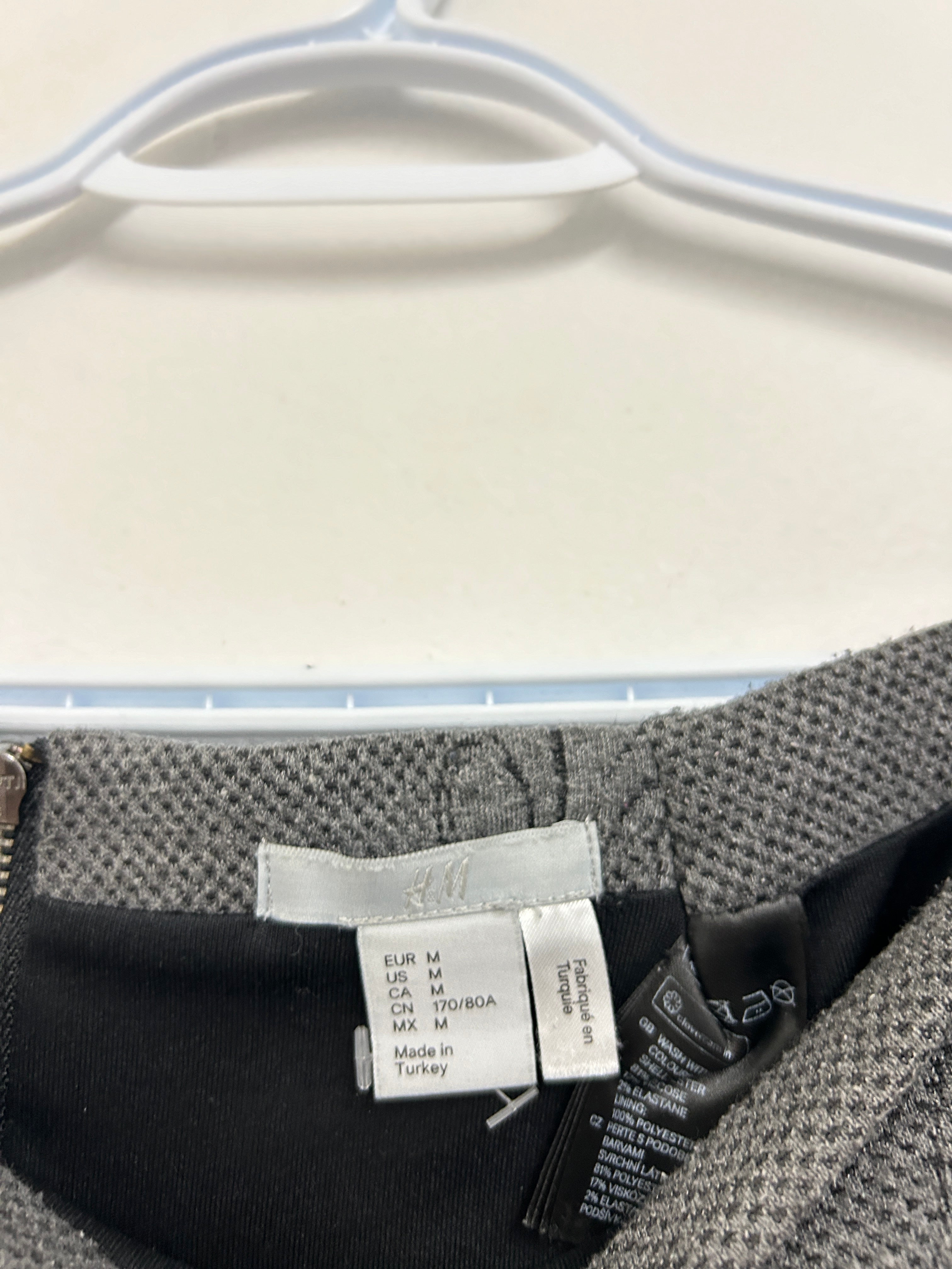 Jupe grise texturée à motifs baroques — H&M