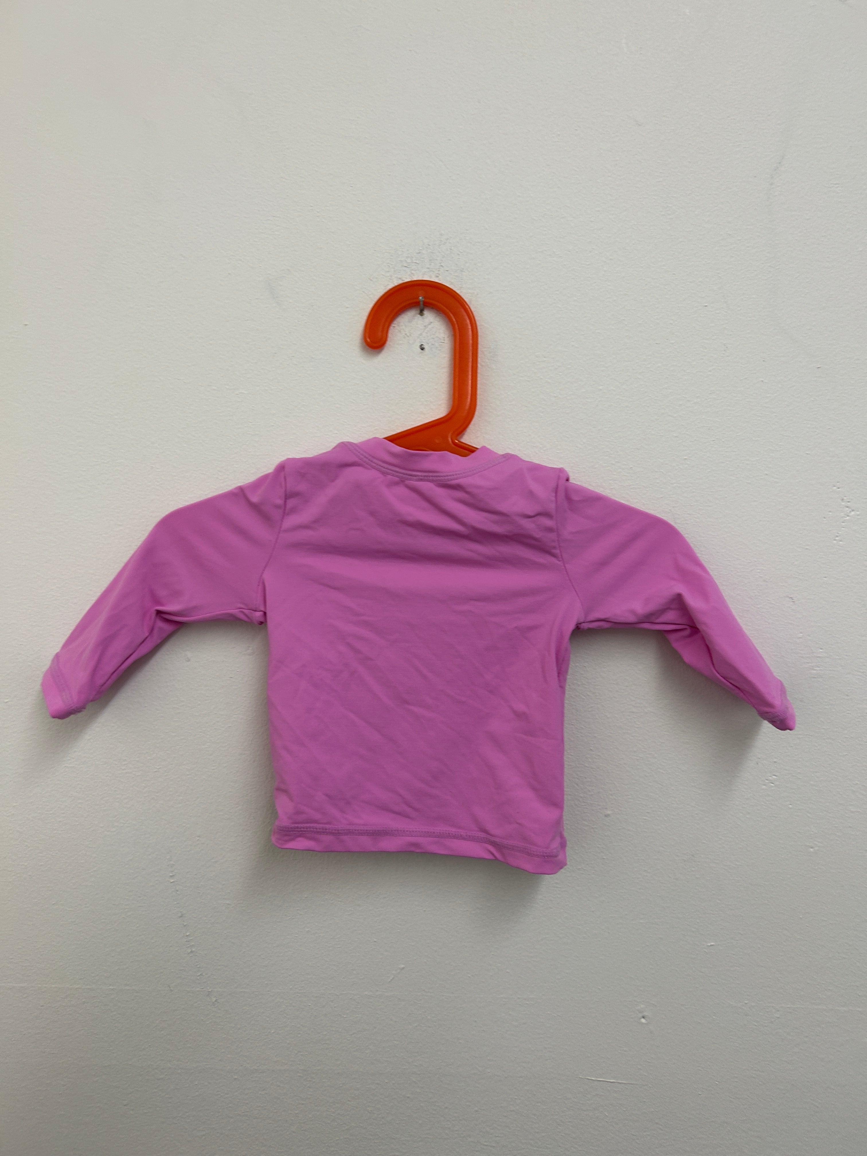 Haut à volants rose — Tag