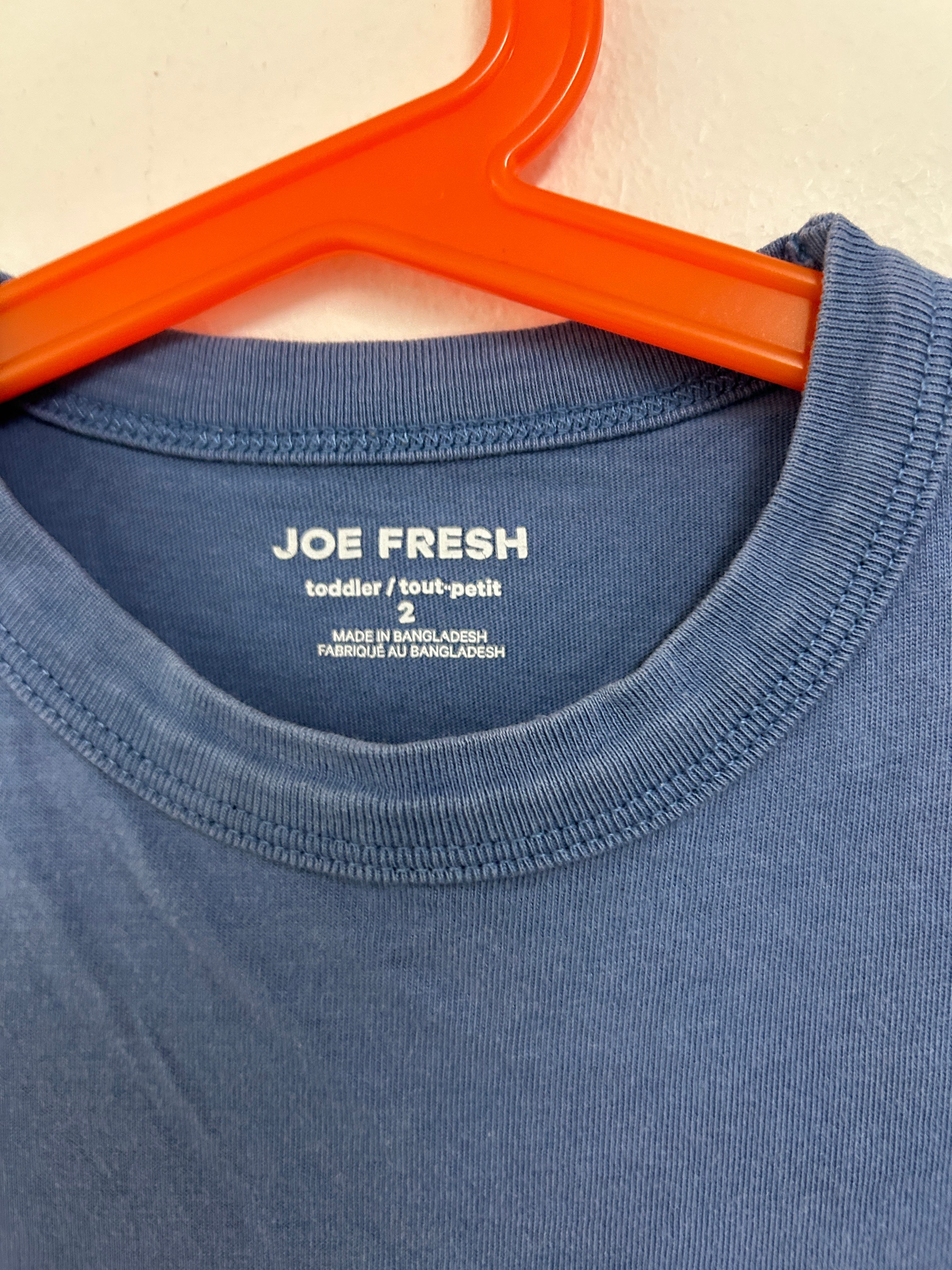 T-shirt bleu à motif dinosaure