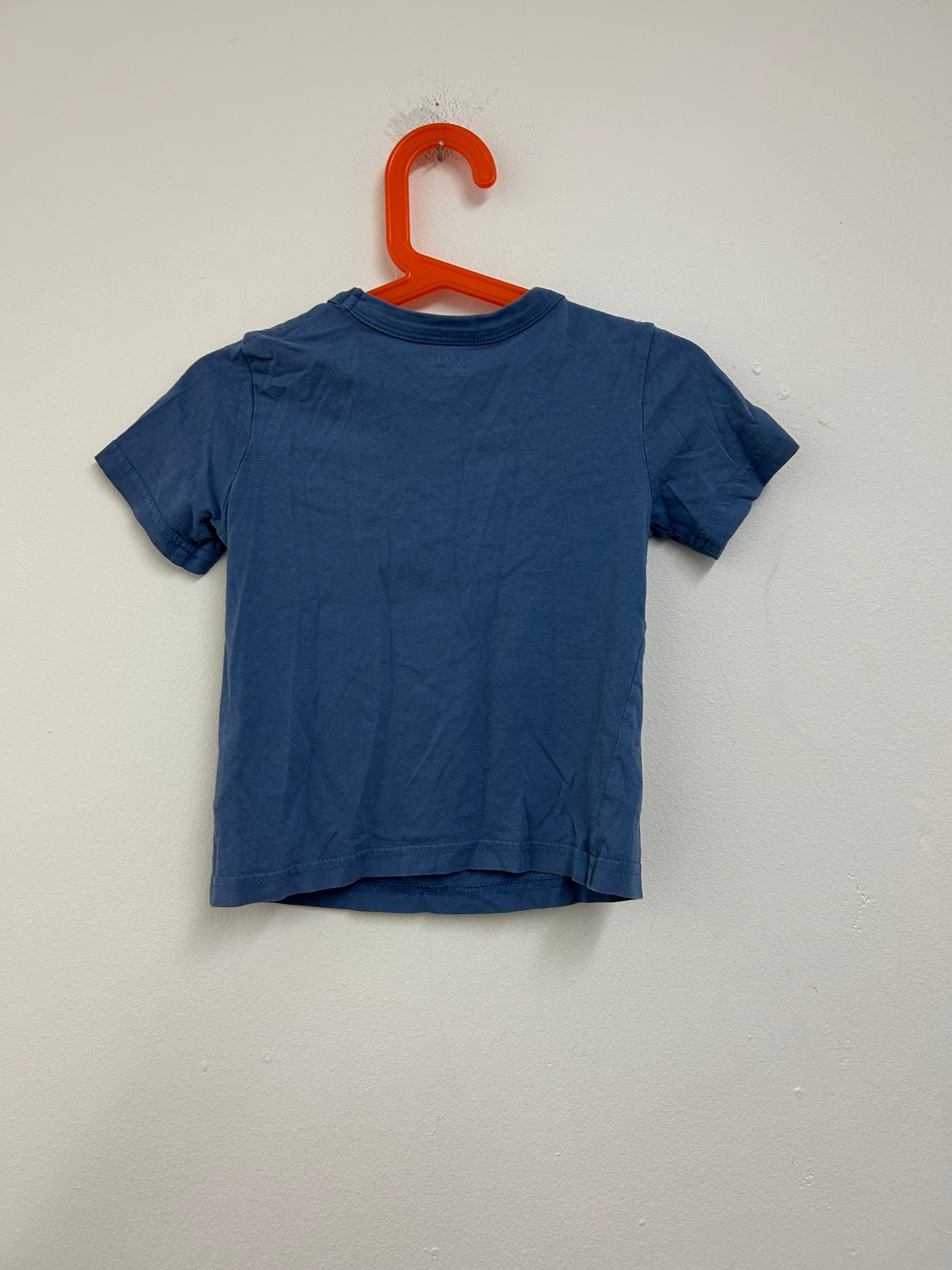 T-shirt bleu à motif dinosaure