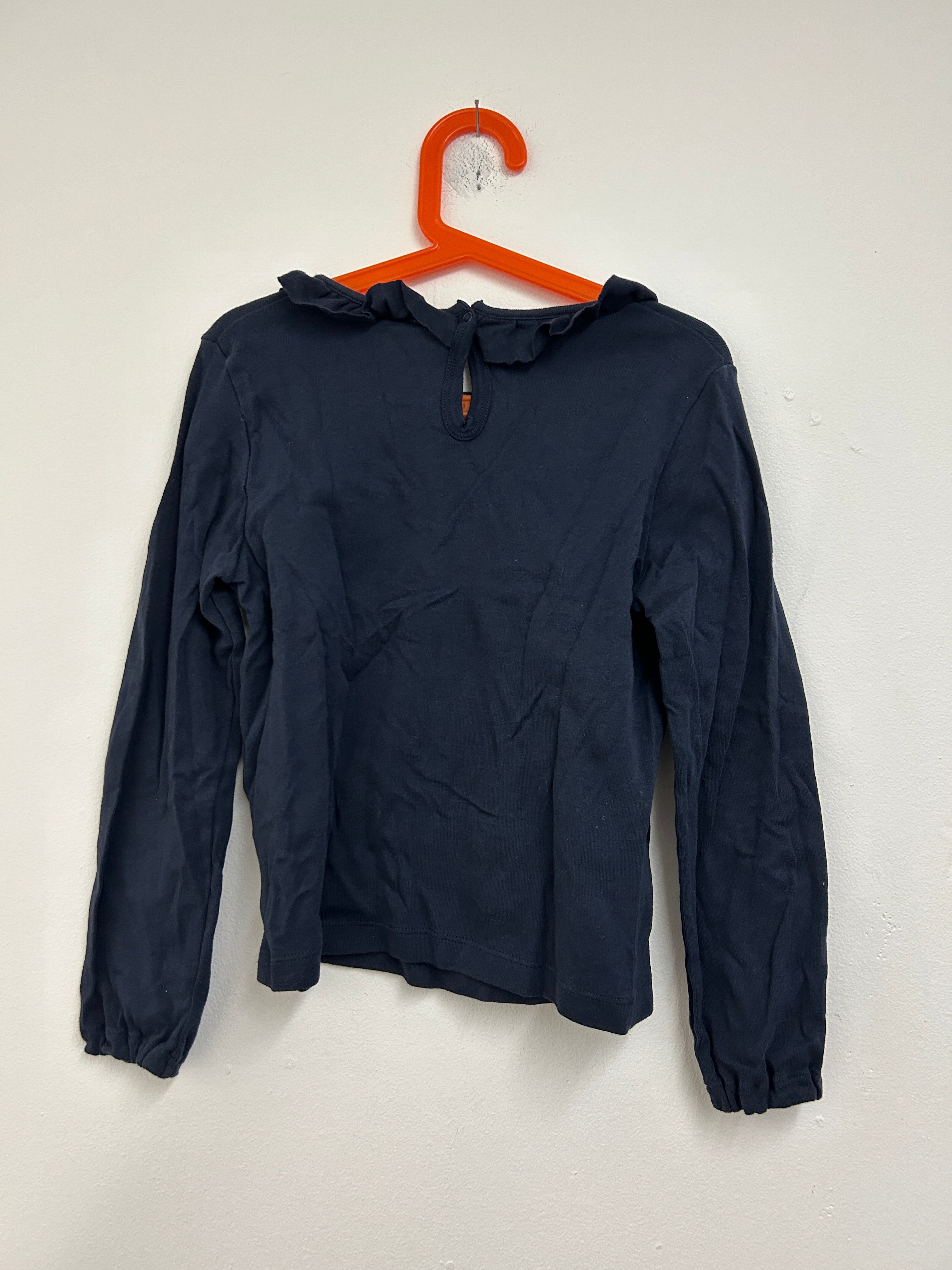 Haut bleu marine à col volanté — Petit Plateau