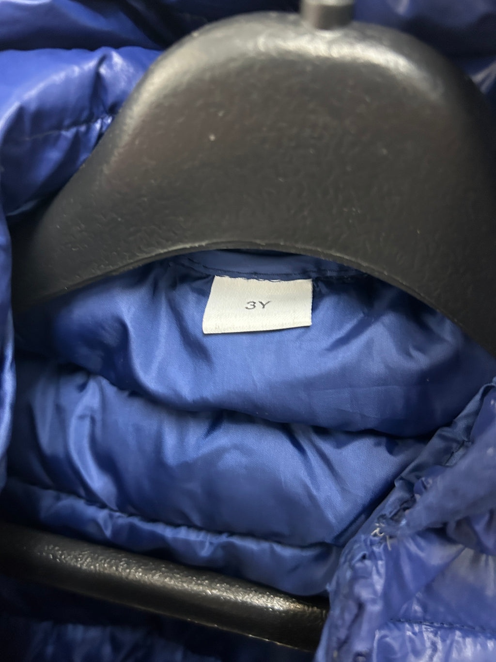 Manteau matelassé bleu marine à capuche oreilles