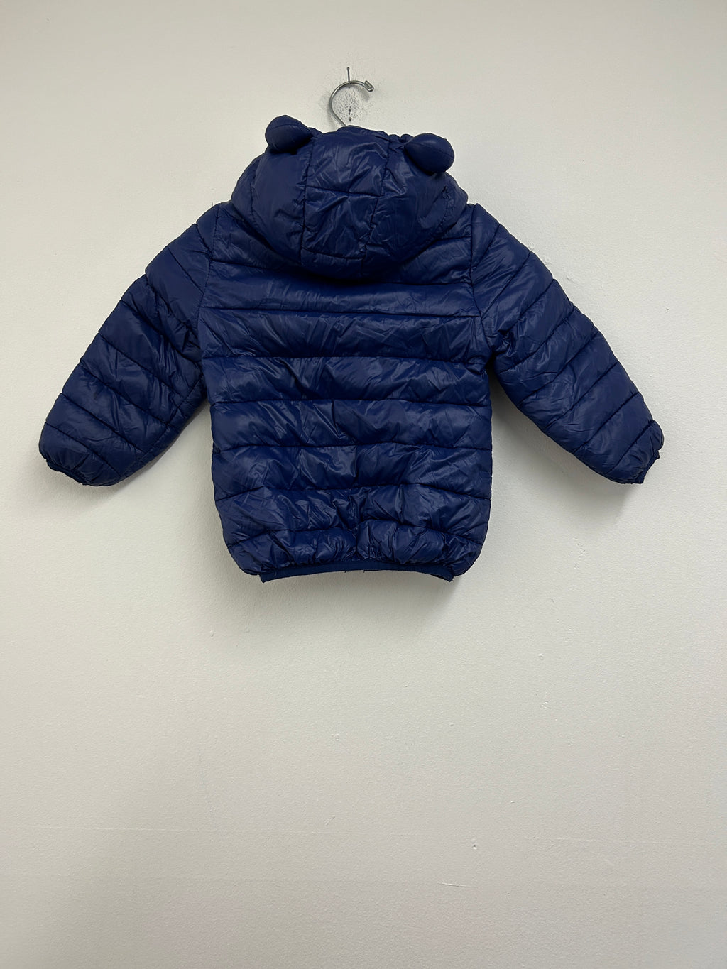 Manteau matelassé bleu marine à capuche oreilles