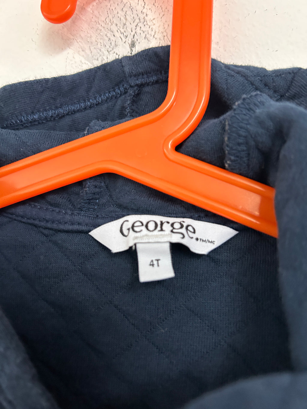 Veste sans manches matelassée à capuche