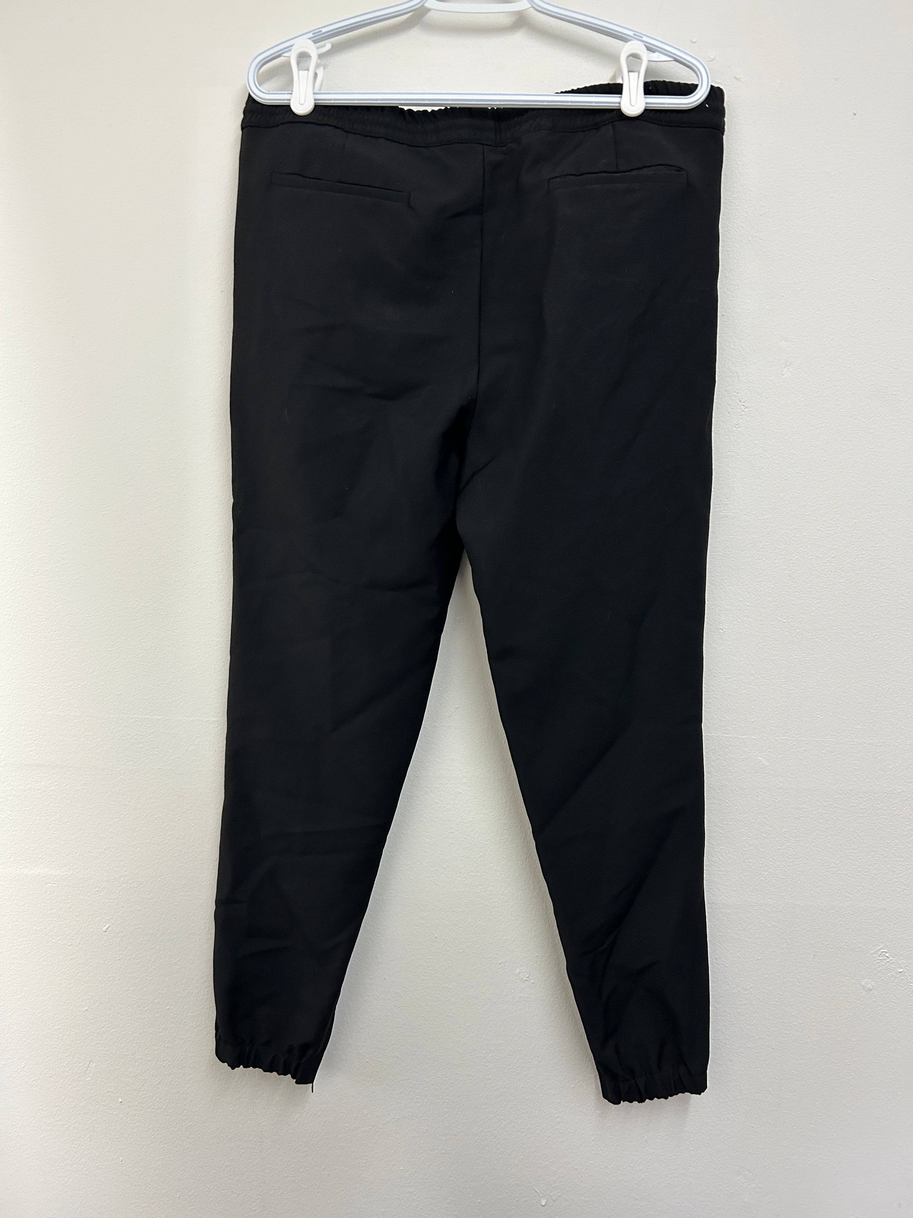 Pantalon noir ajusté à cordon — KRISVANASSCHE