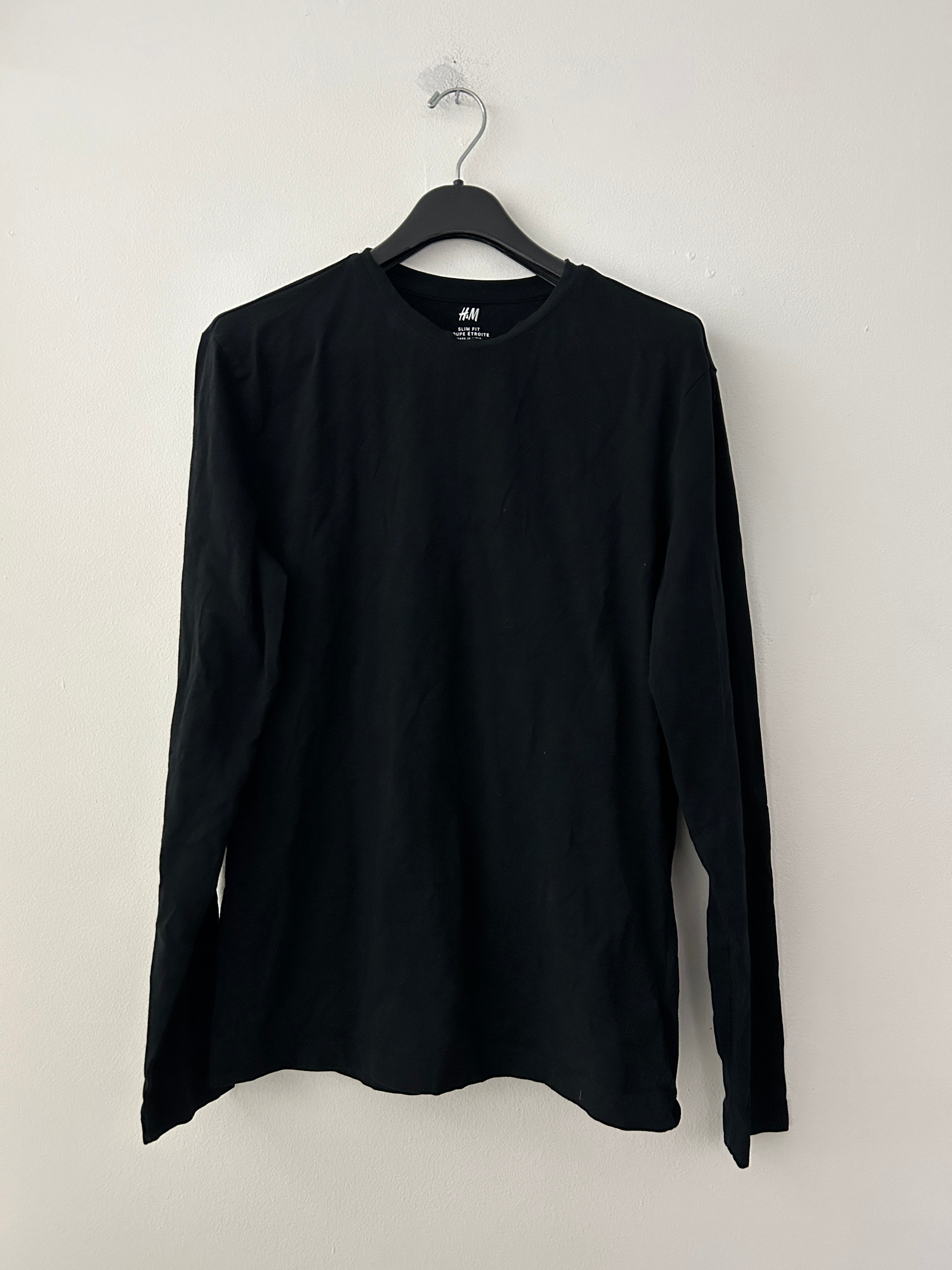 chandail-noir-a-manches-longues-h-m