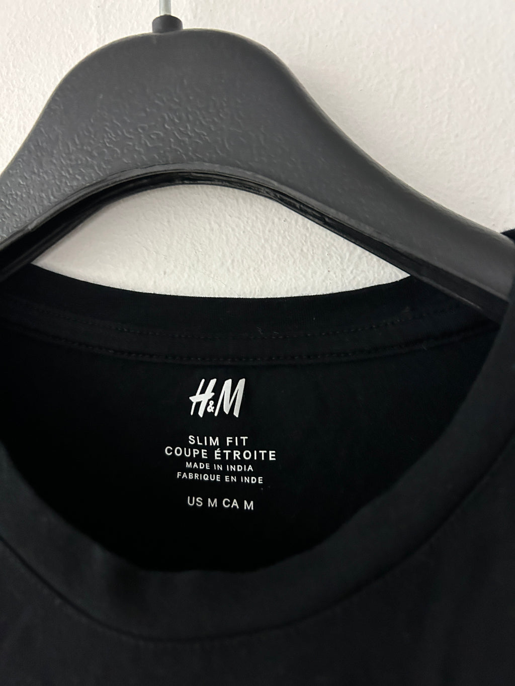 chandail-noir-a-manches-longues-h-m