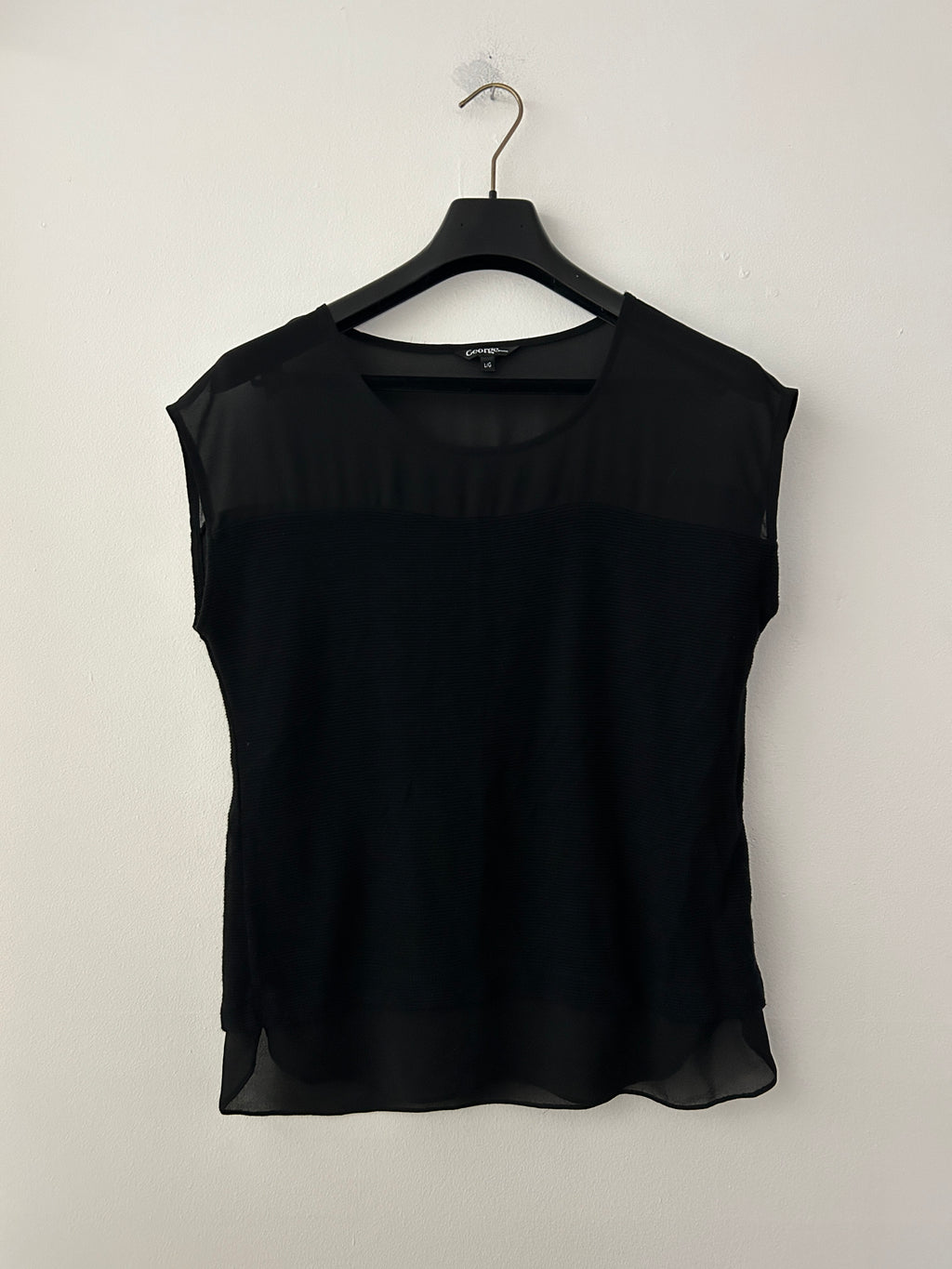 Haut noir semi-transparent à effet superposé