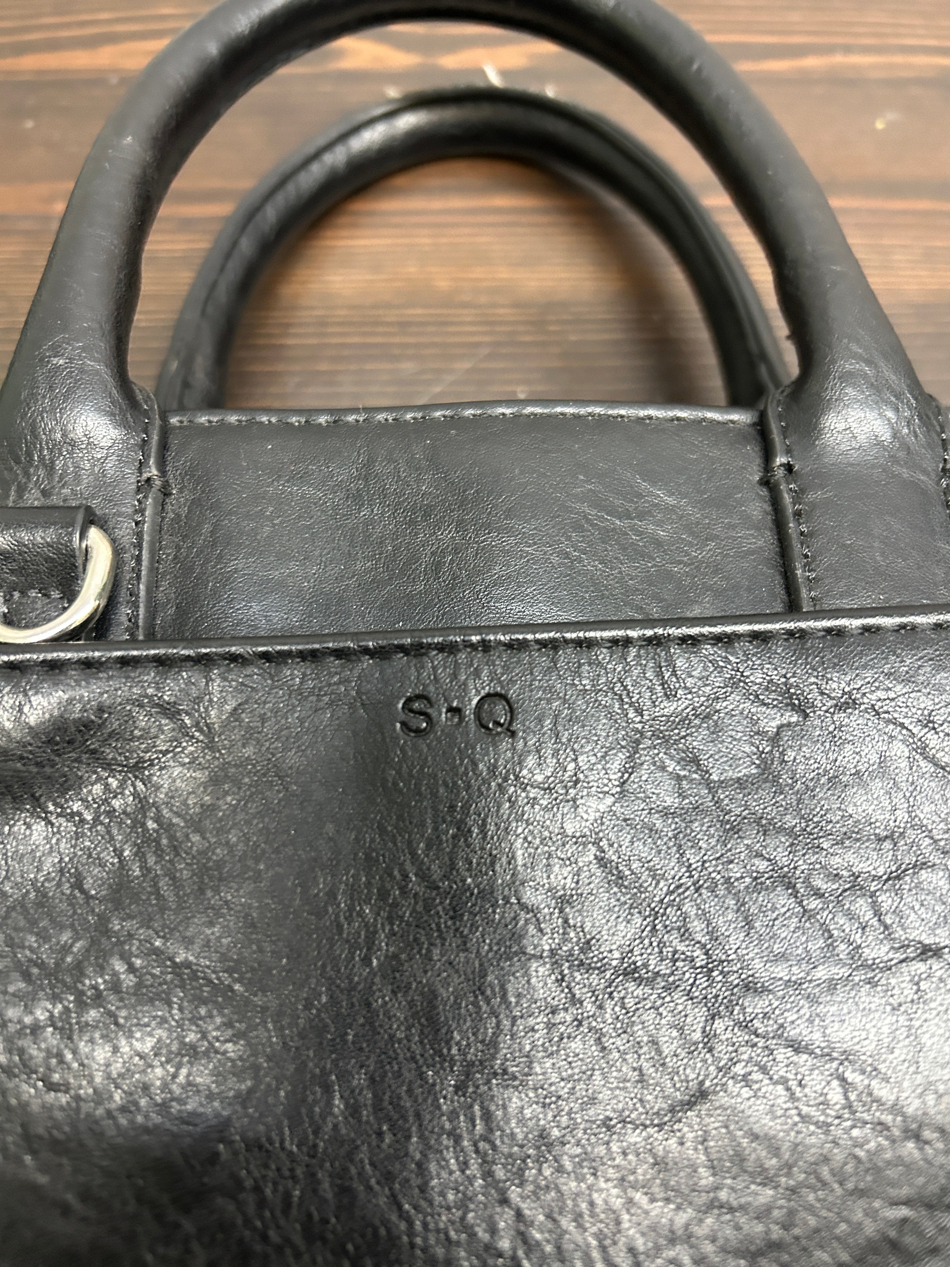 Sac à main noir à double poignées — S-Q
