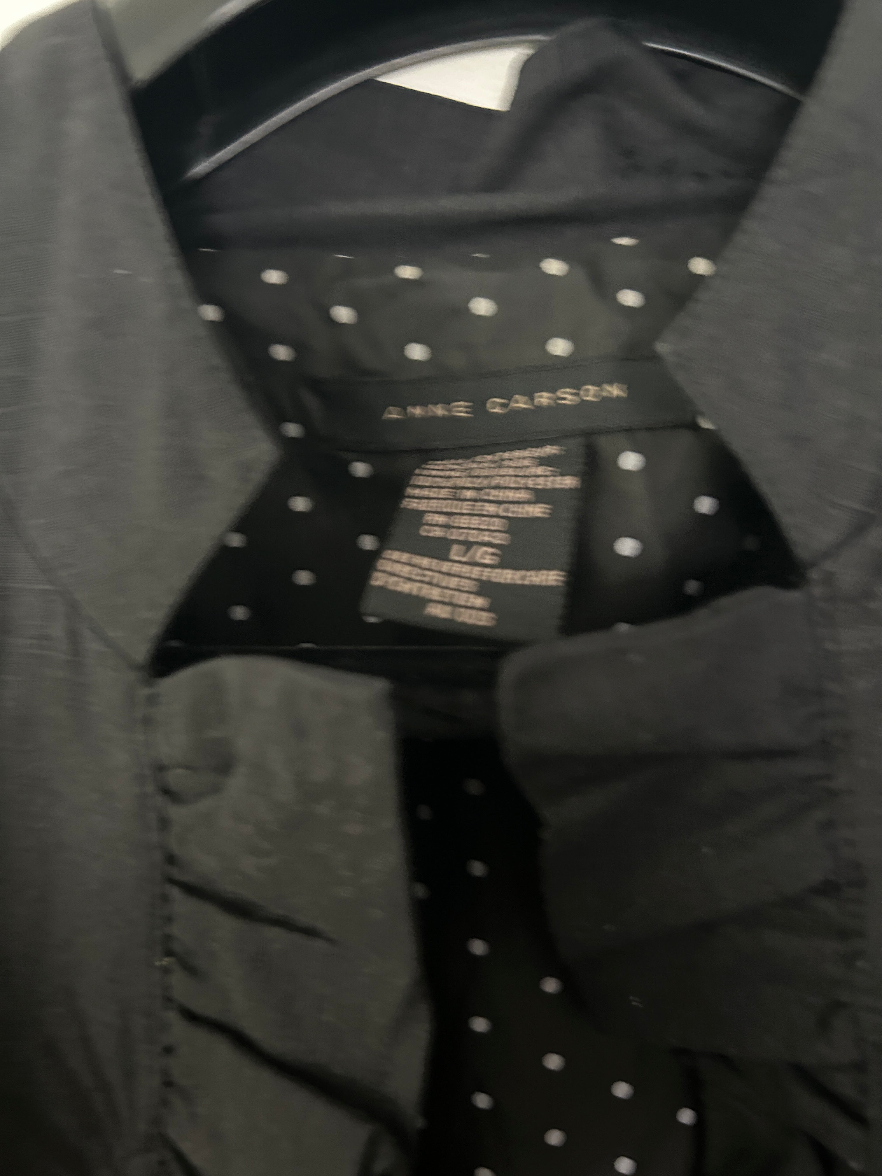 Veste noire volantée – Anne Carson